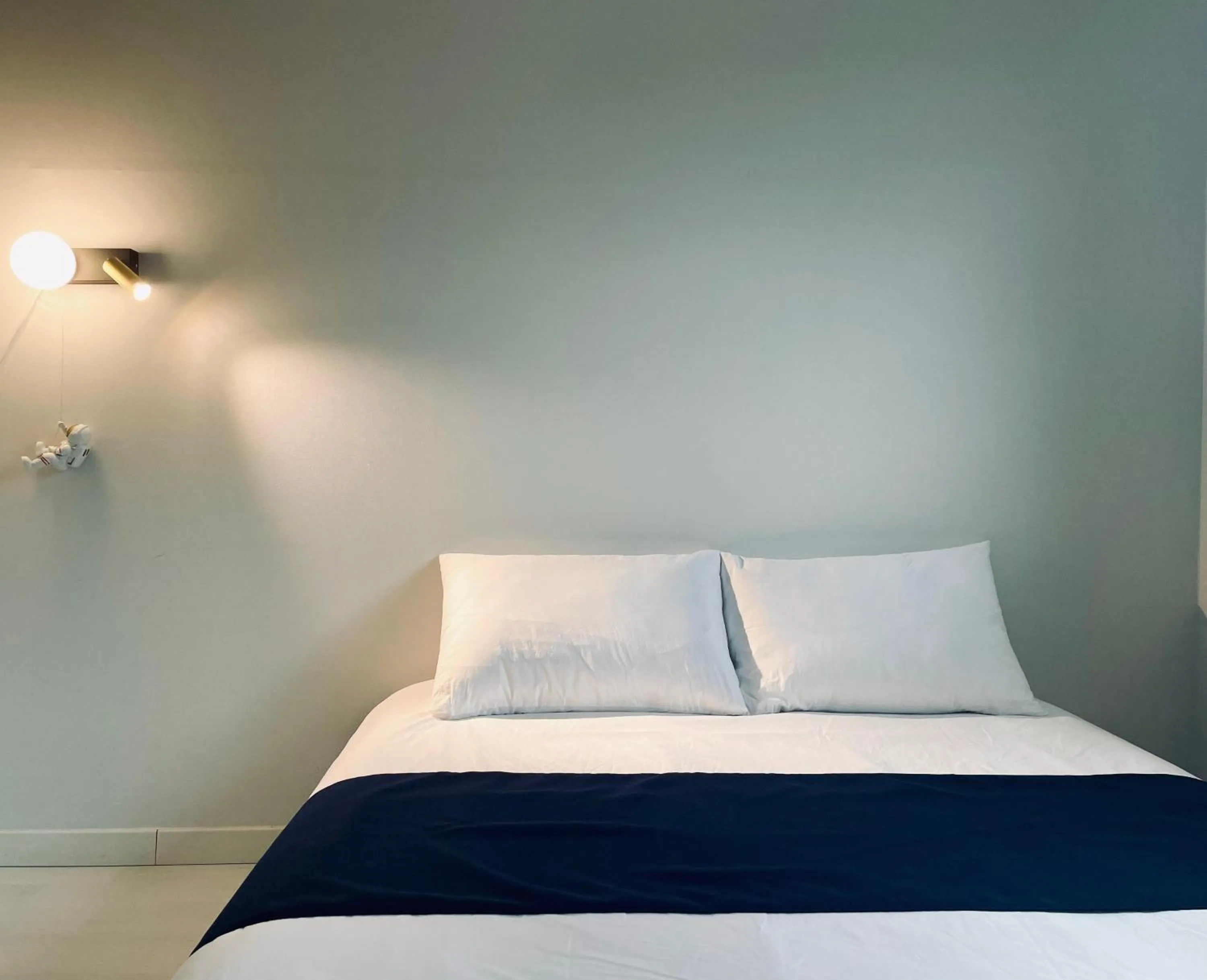 Bed in Jeju Private Poolvilla Gwakjidaon Stay