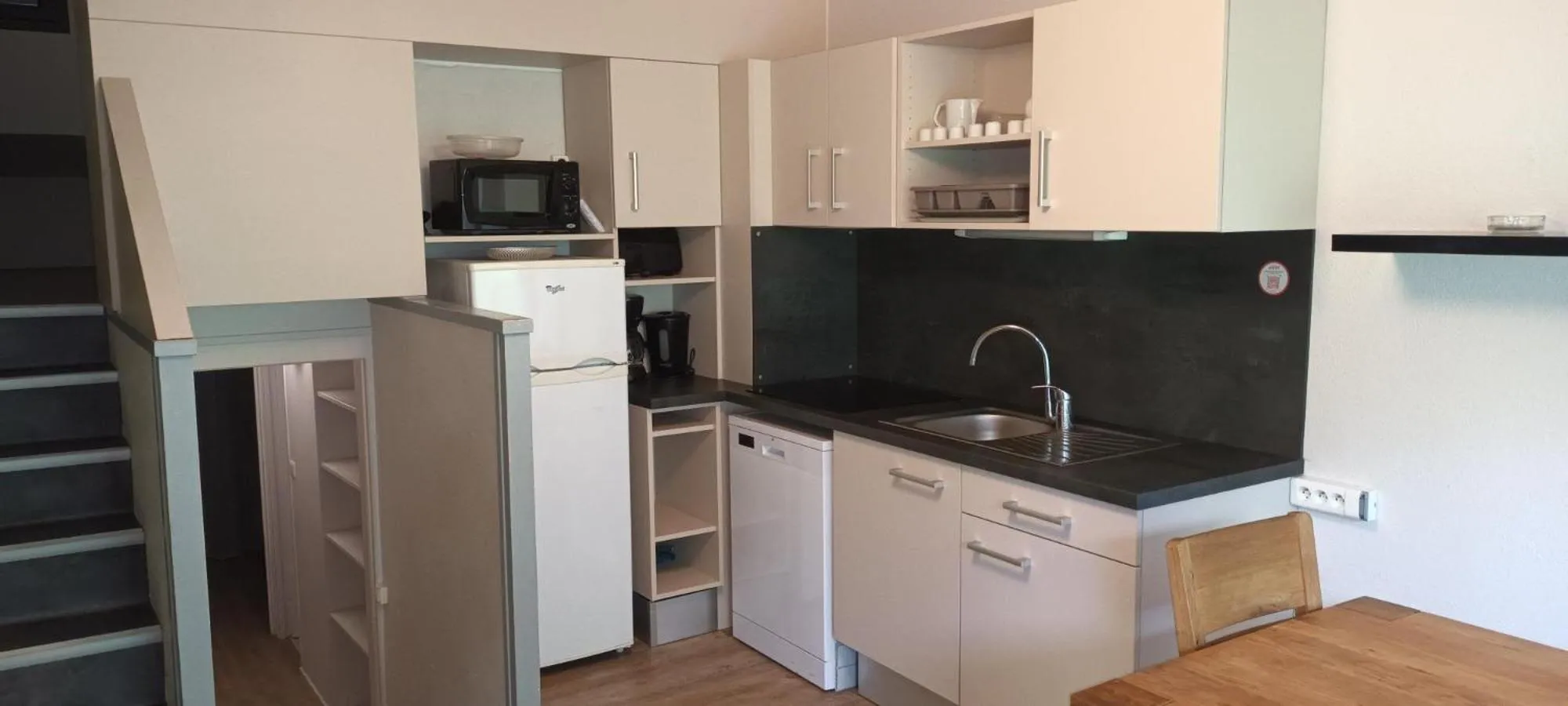 Kitchen or kitchenette in VVF Haute Loire Saint-Julien-Chapteuil