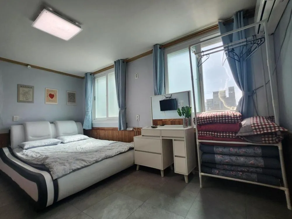 Bed in Yeosu Daoljang Guesthouse