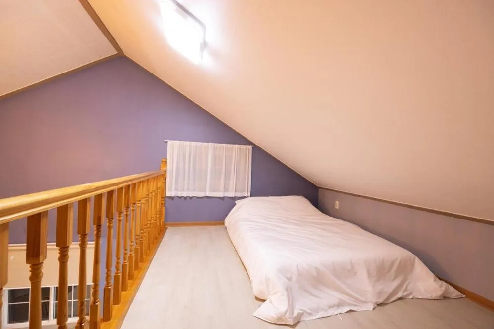 Bed in Taean Oceanhill Resort Pension