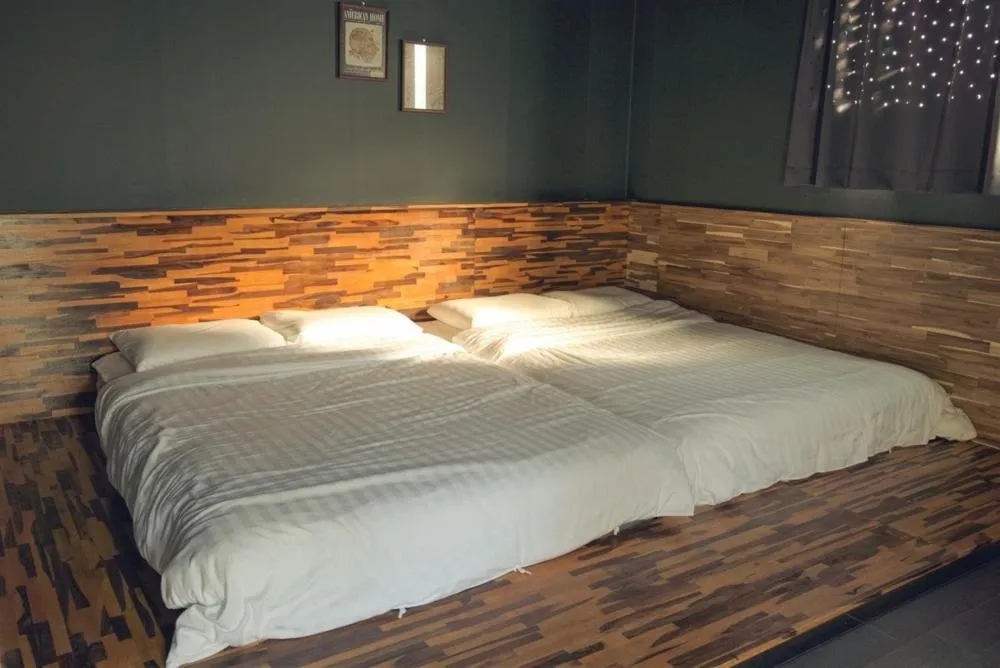 Bed in Jeju Blanc Jade Pool Villa