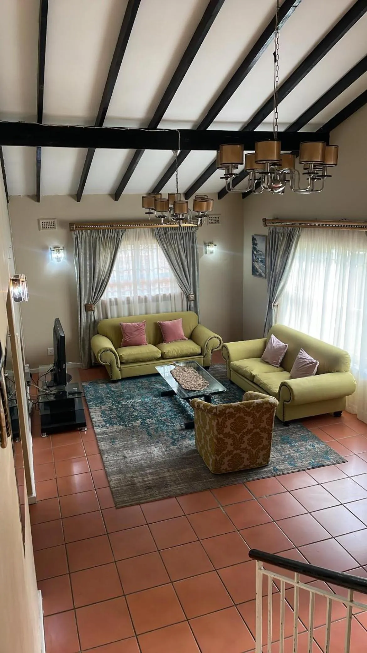 Communal lounge/ TV room in Carrington Guest House