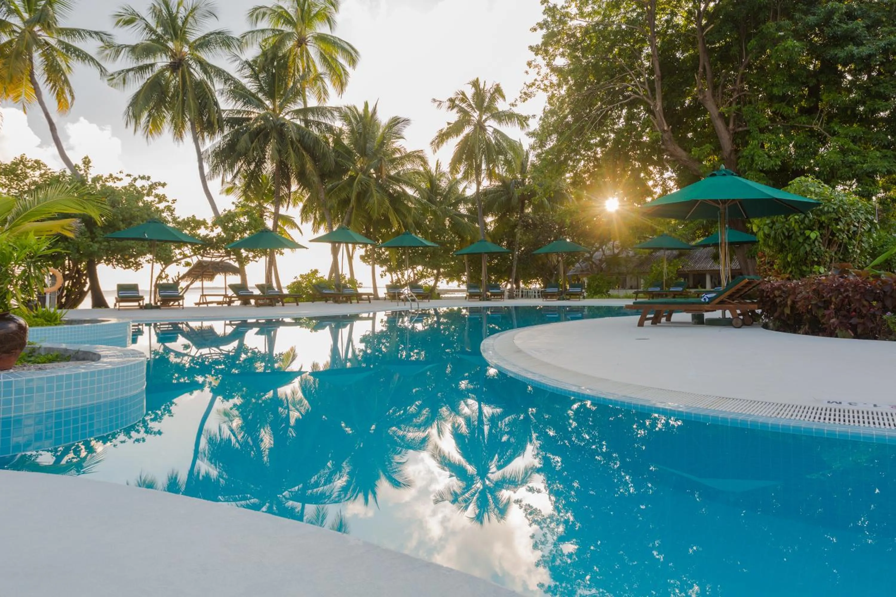 Pool view in Equator Village Maldives