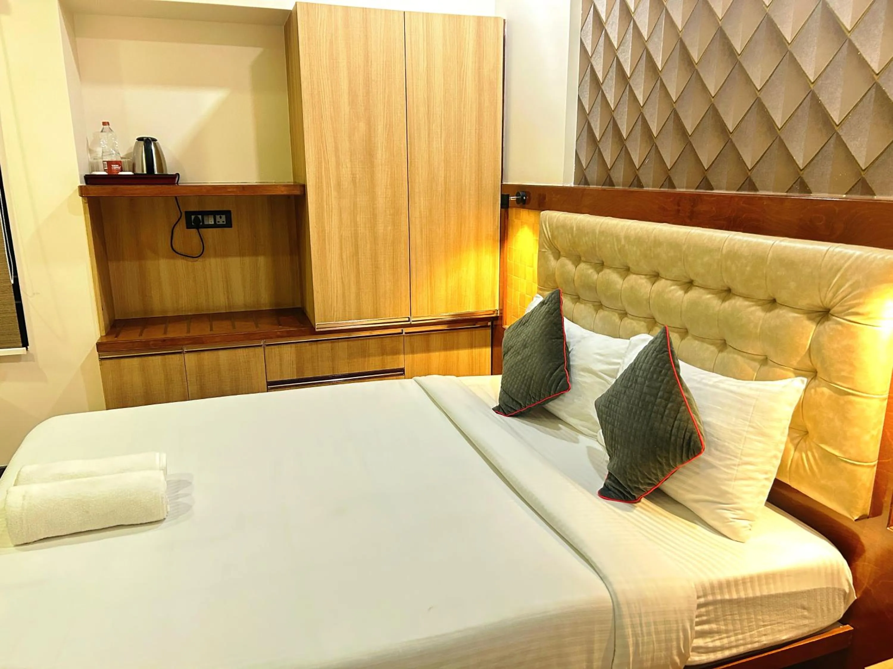 Bed in Hotel Rize Inn