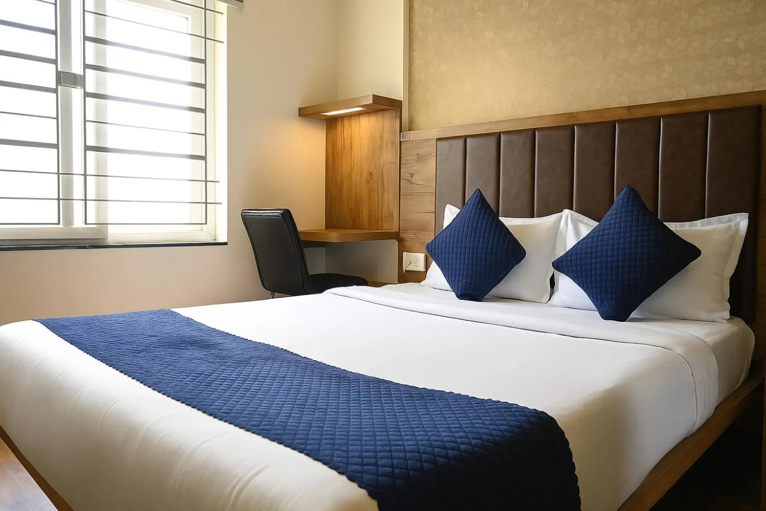 Bed in Hotel Rize Inn