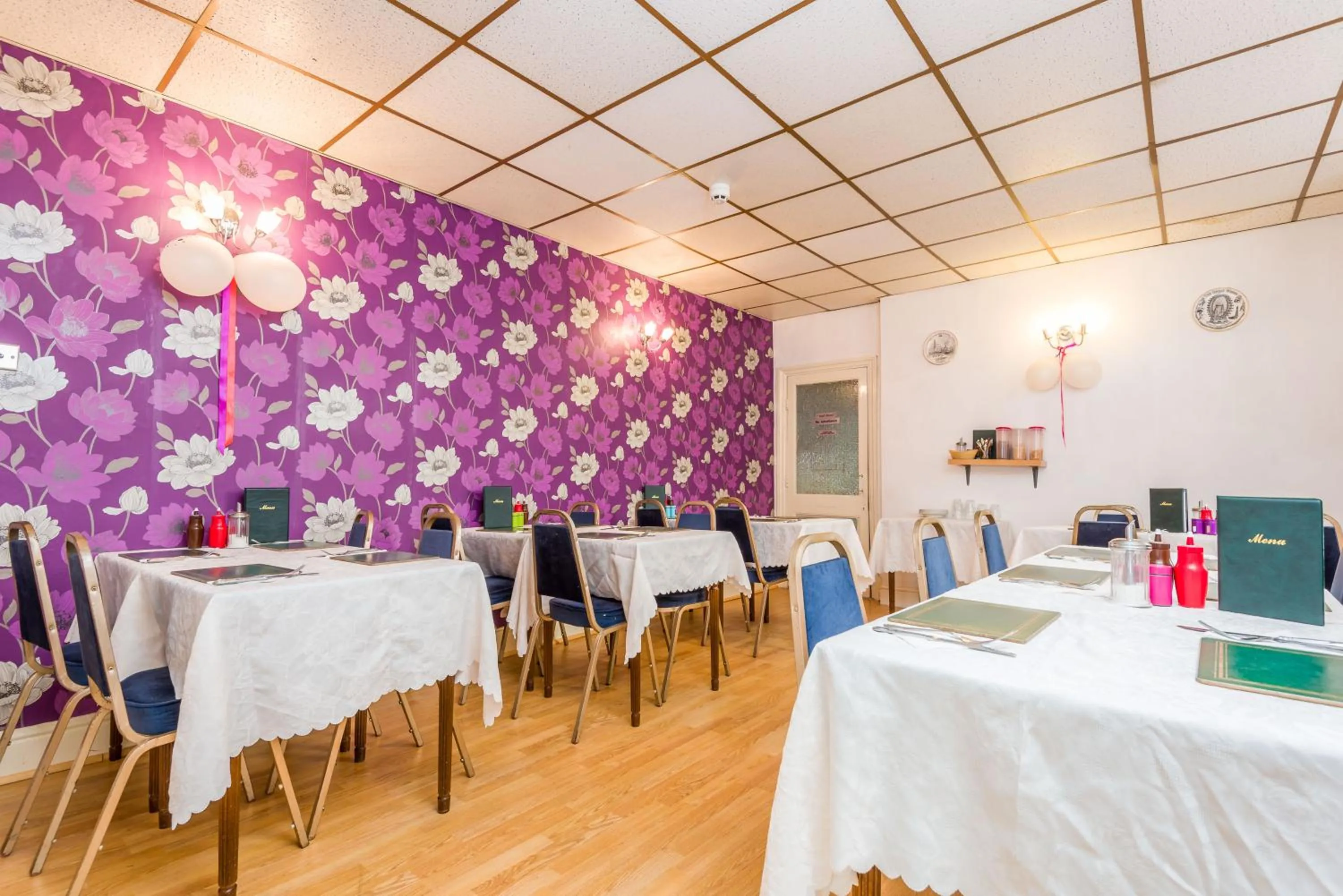 Dining area in UK Travel & Hospitality LTD TA Canberra Hotel