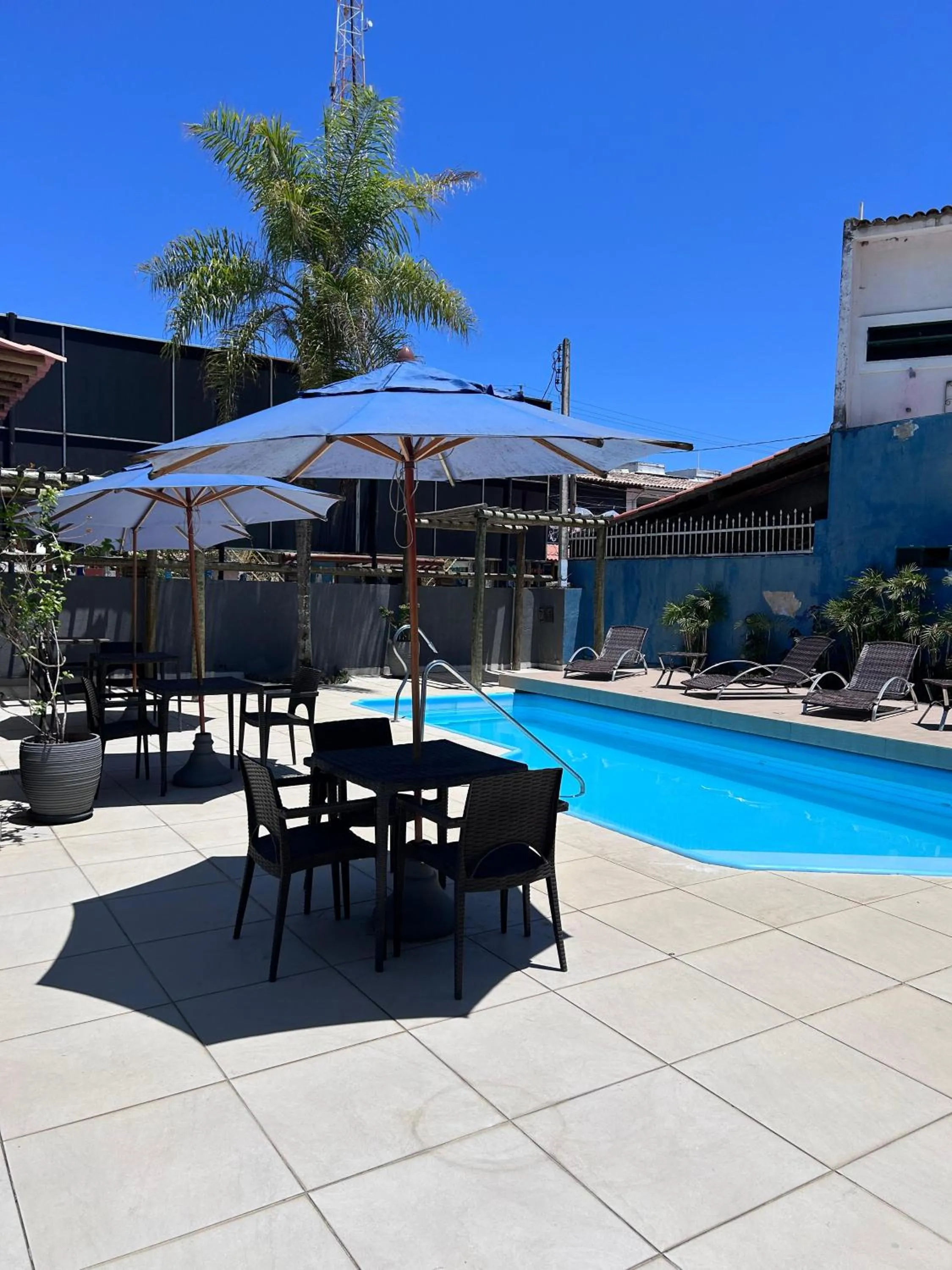 Swimming pool in Pousada Aconchego