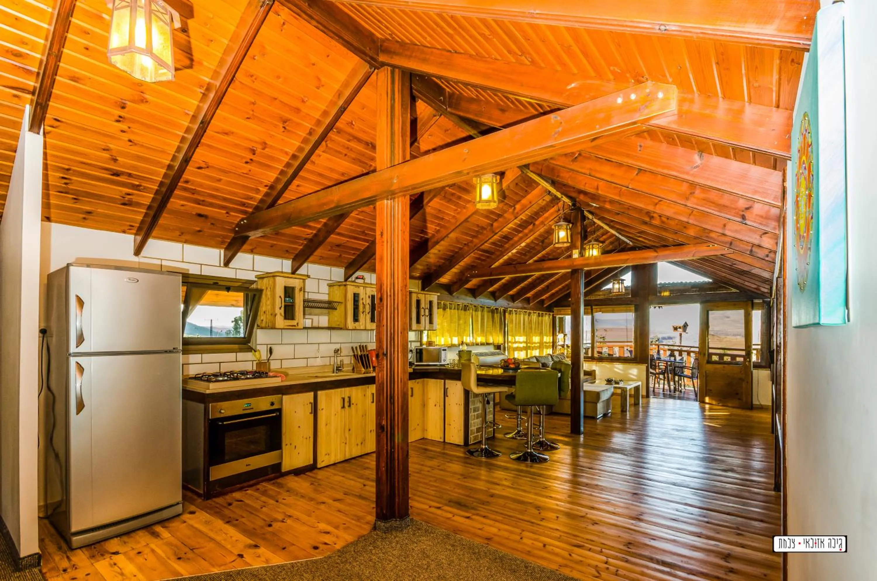 Communal kitchen in Beautiful Lake View Wooden House