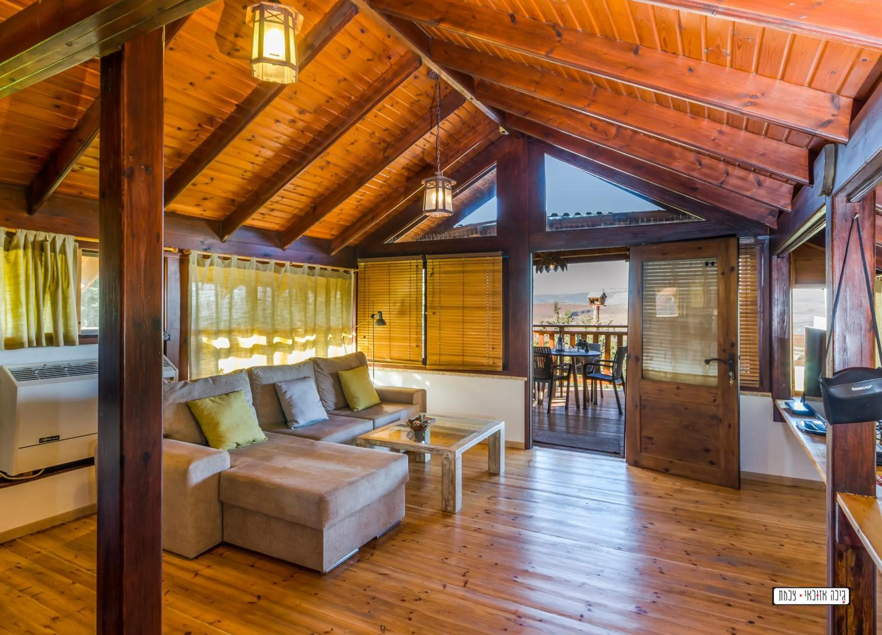 Living room in Beautiful Lake View Wooden House