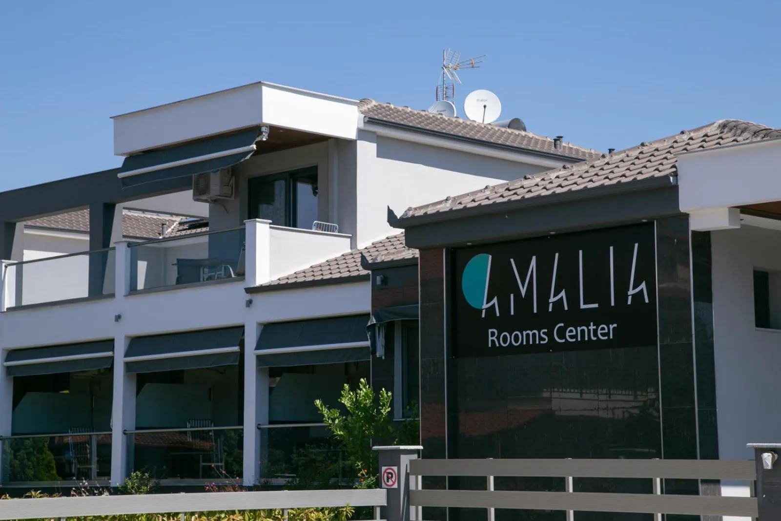 Property logo or sign in Amalia Center