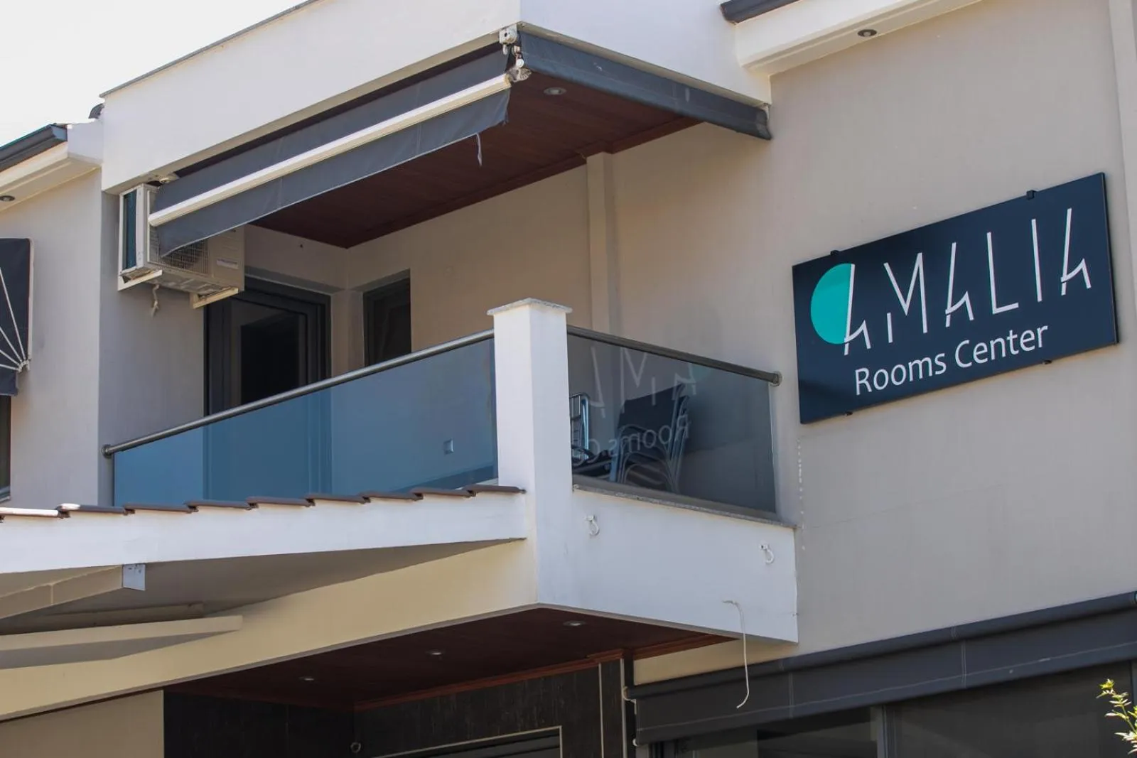 Property logo or sign in Amalia Center