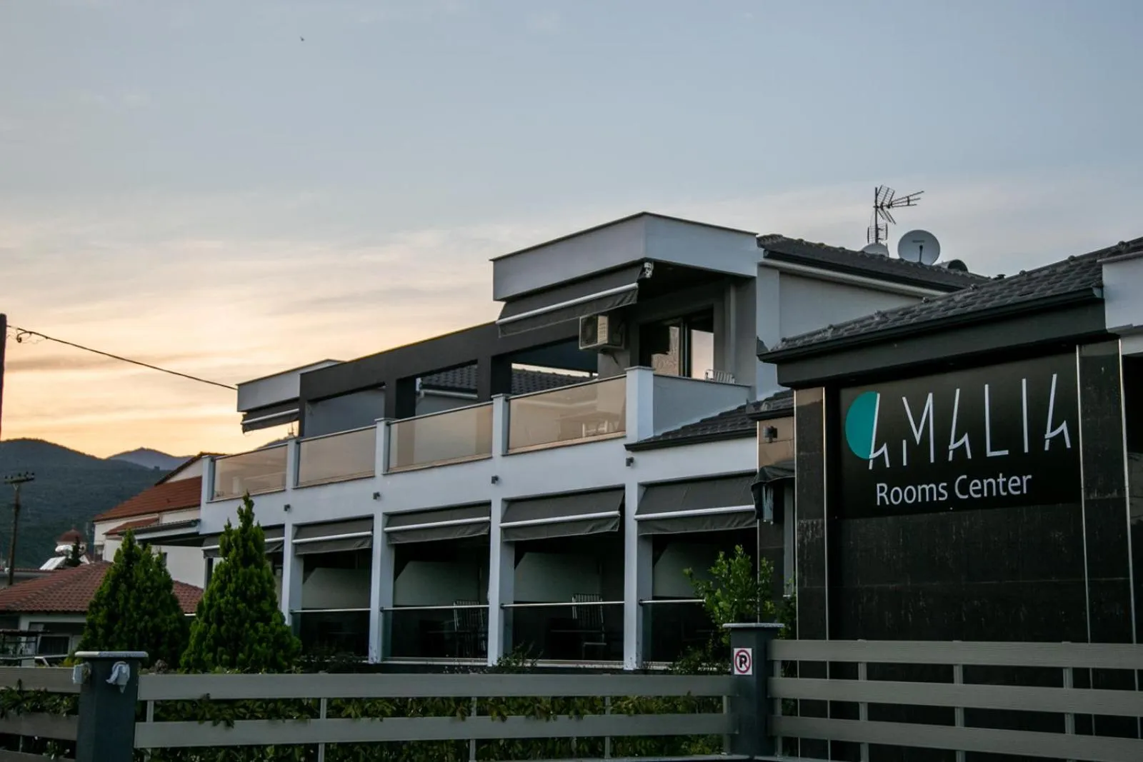 Property logo or sign in Amalia Center