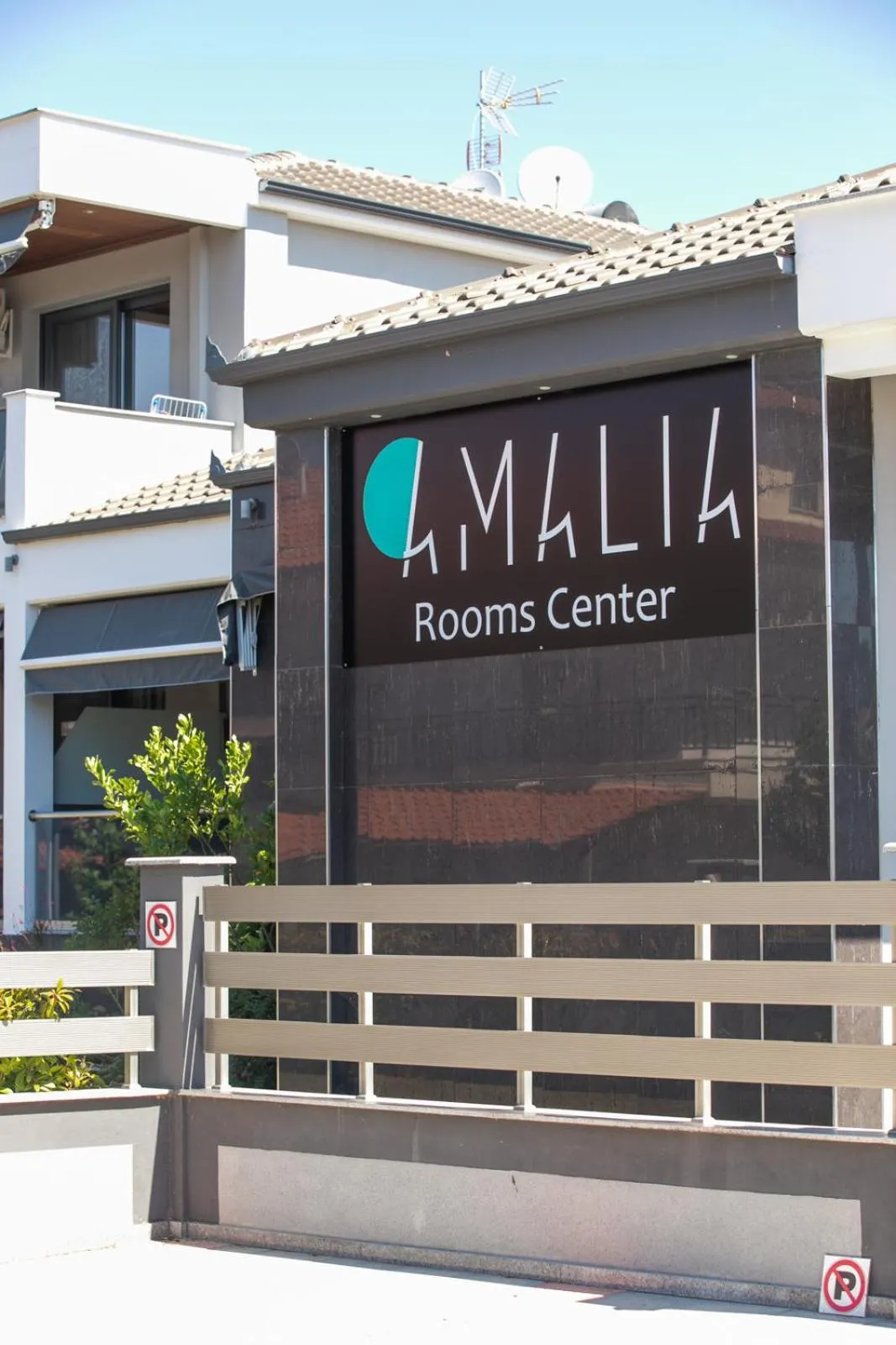 Property logo or sign in Amalia Center
