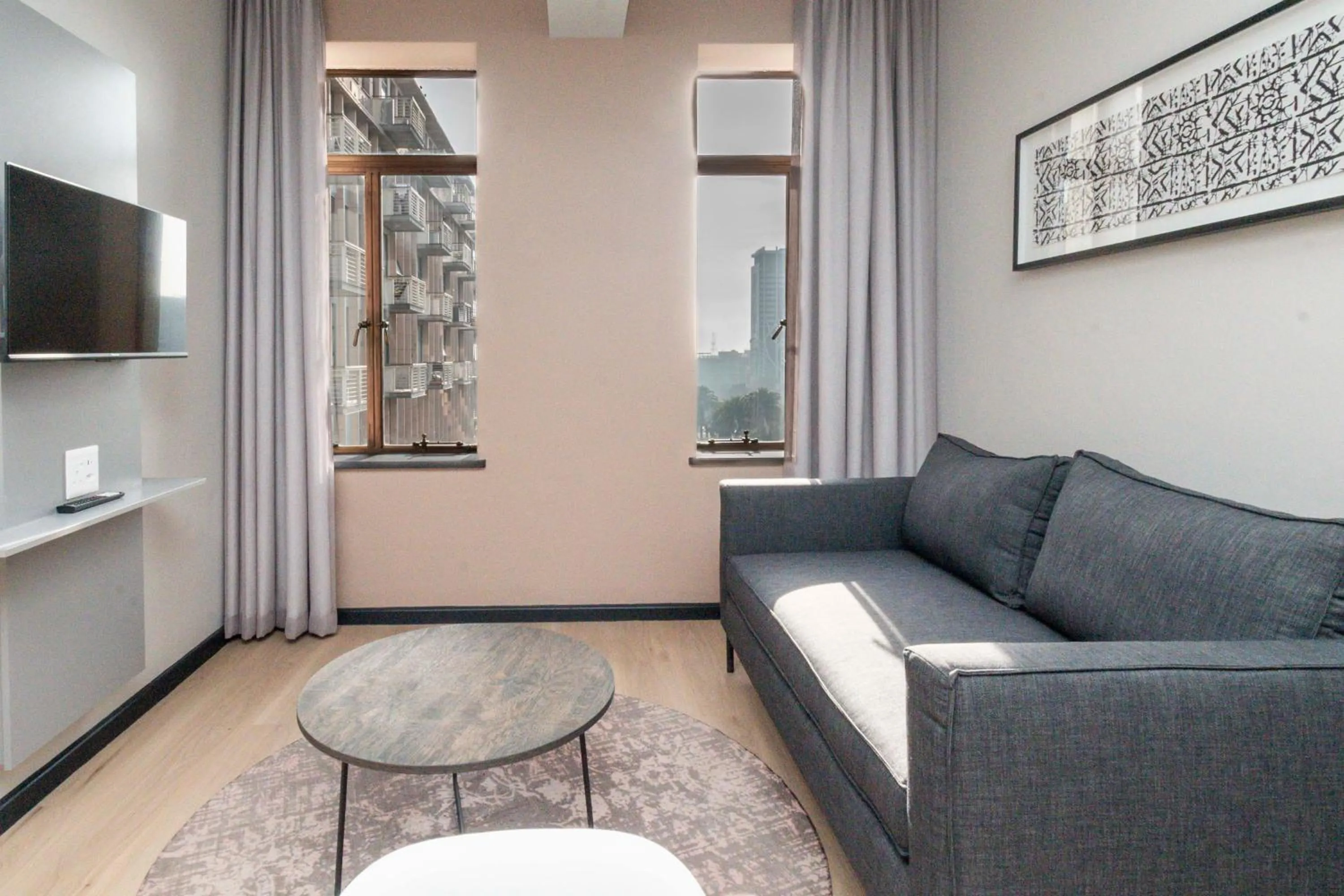 Living room in HAVN Aparthotel by Totalstay