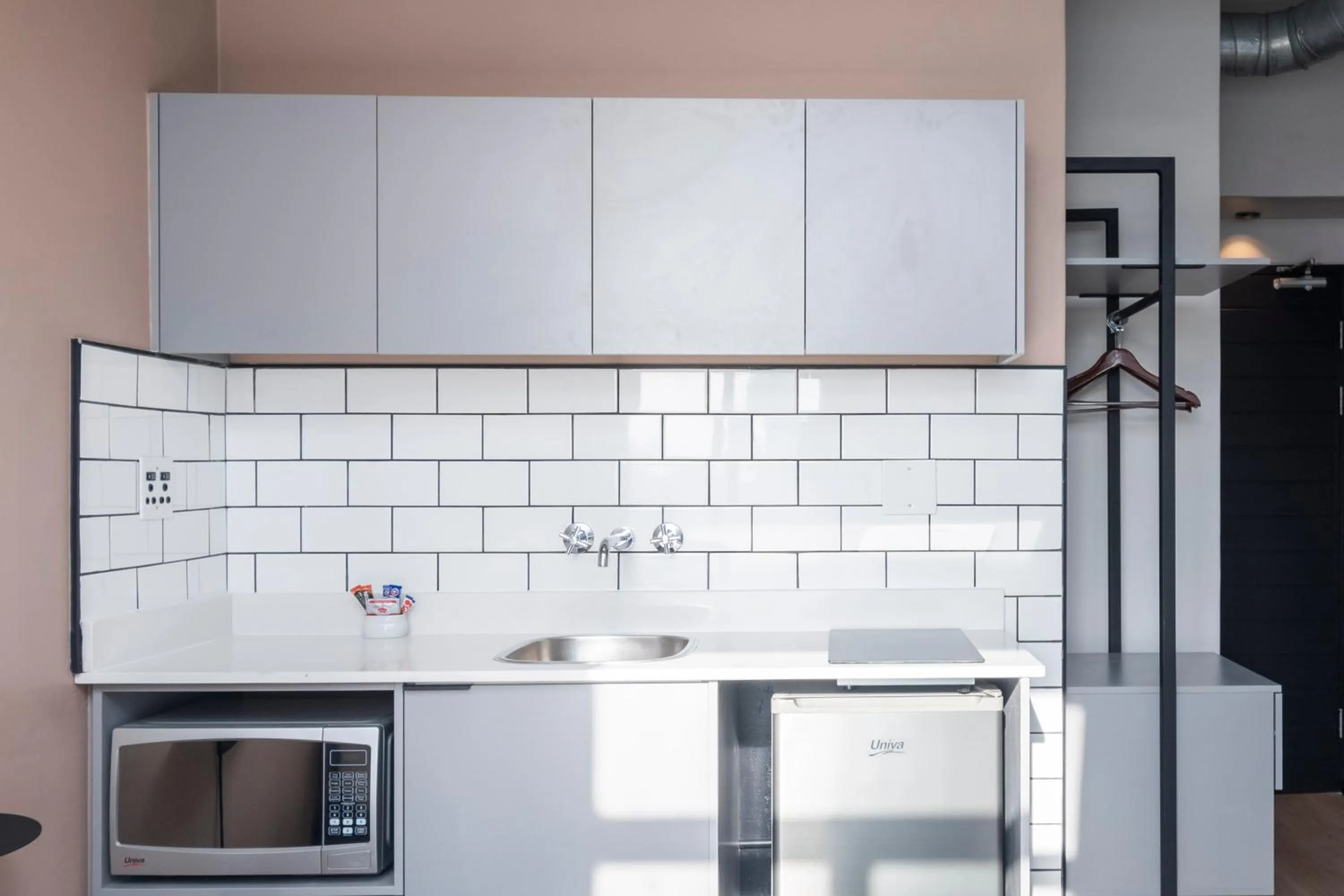 Kitchen or kitchenette in HAVN Aparthotel by Totalstay