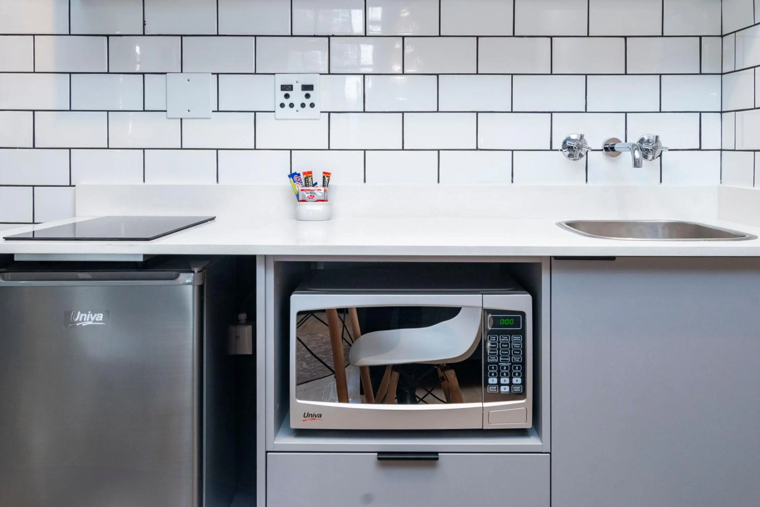 Kitchen or kitchenette in HAVN Aparthotel by Totalstay