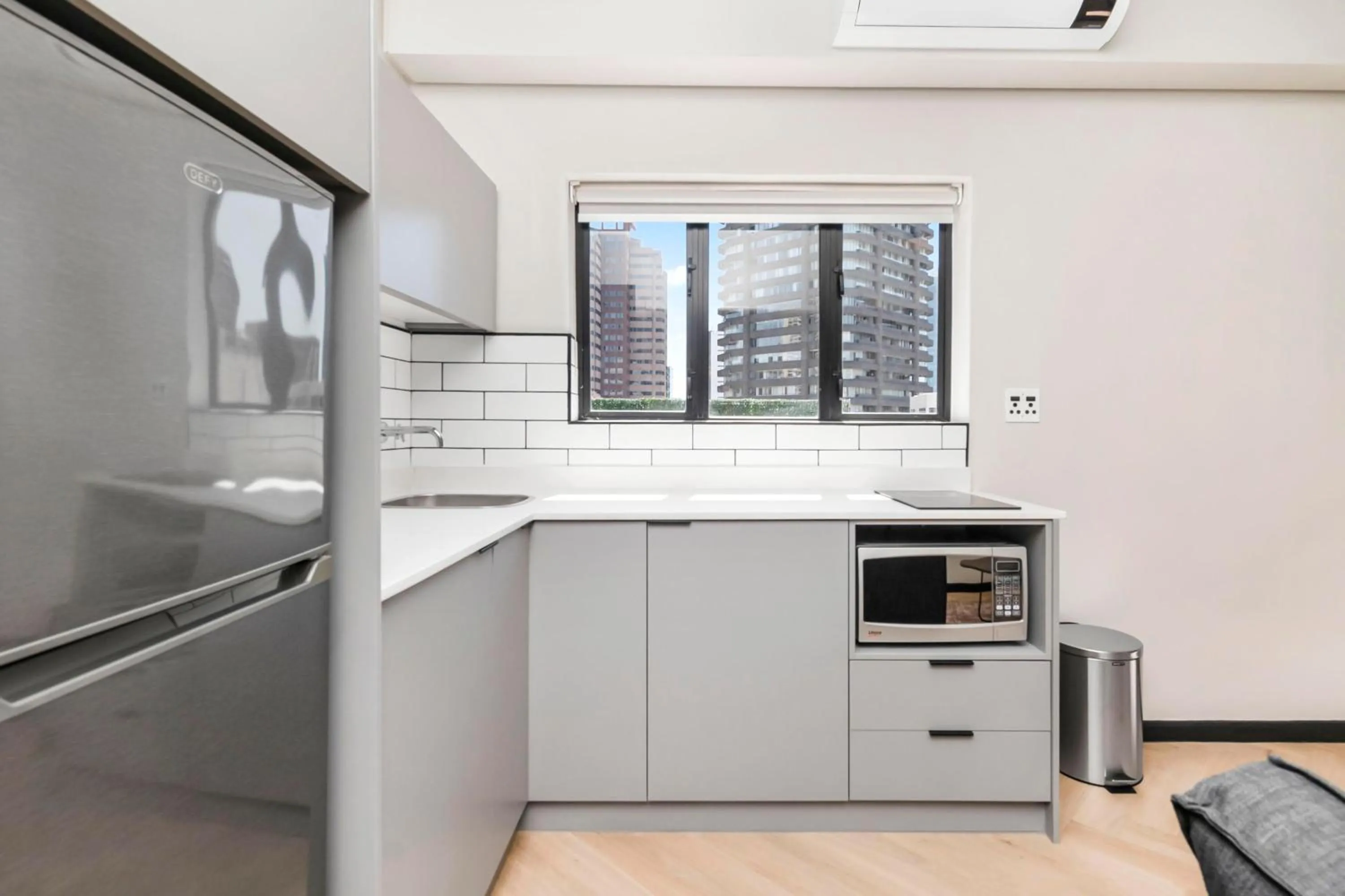 Kitchen or kitchenette in HAVN Aparthotel by Totalstay