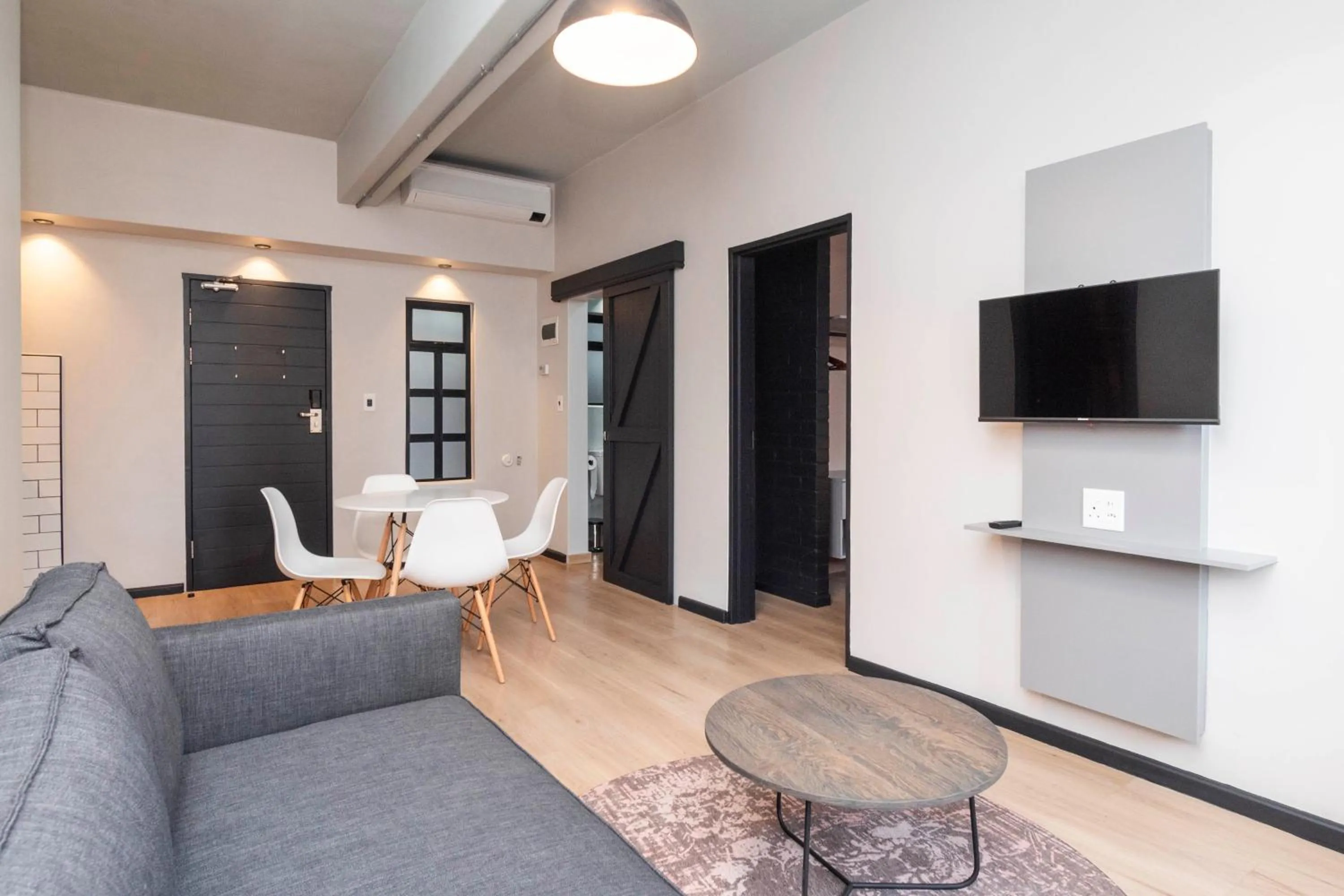 Living room in HAVN Aparthotel by Totalstay