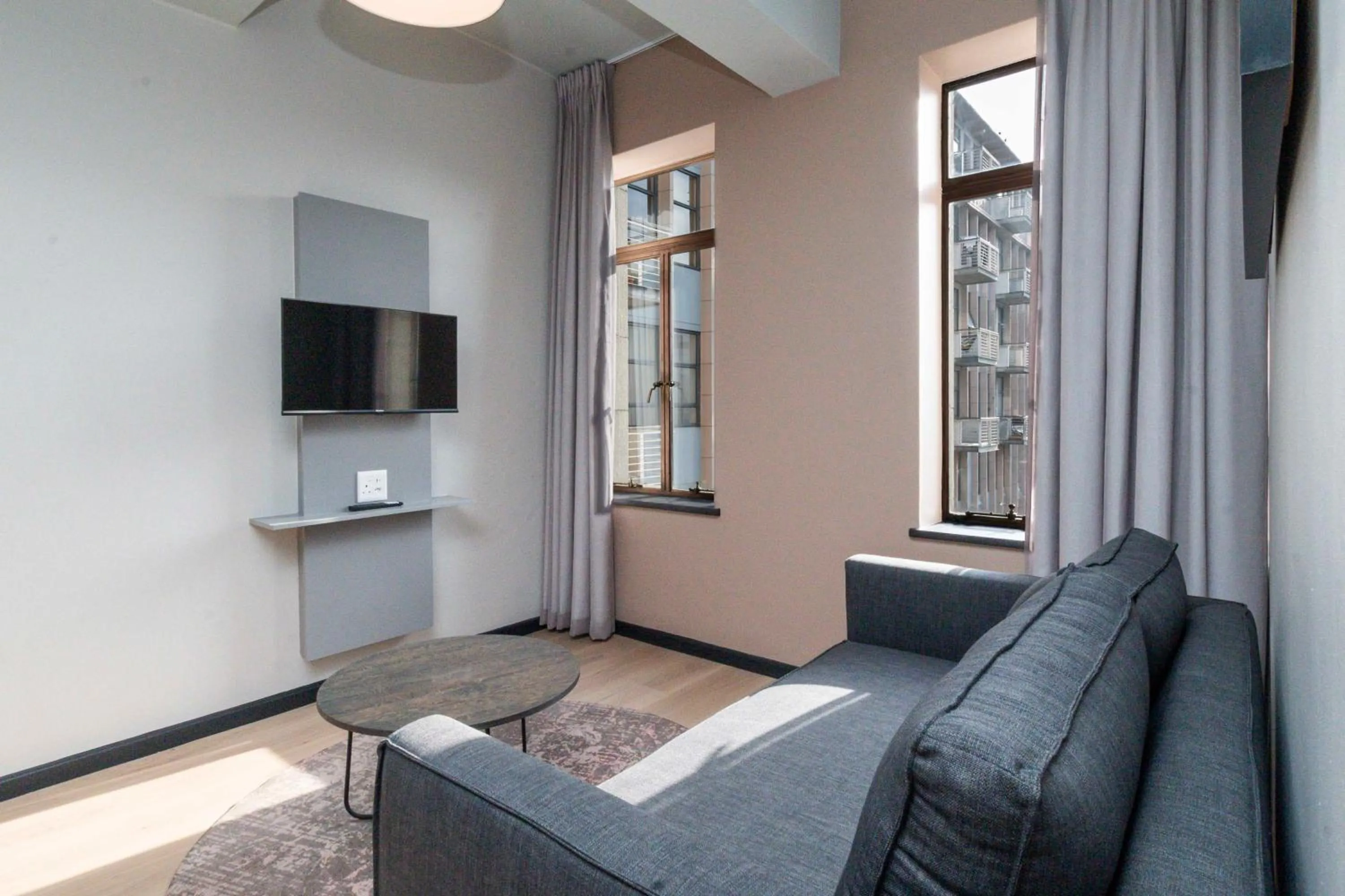 Living room in HAVN Aparthotel by Totalstay