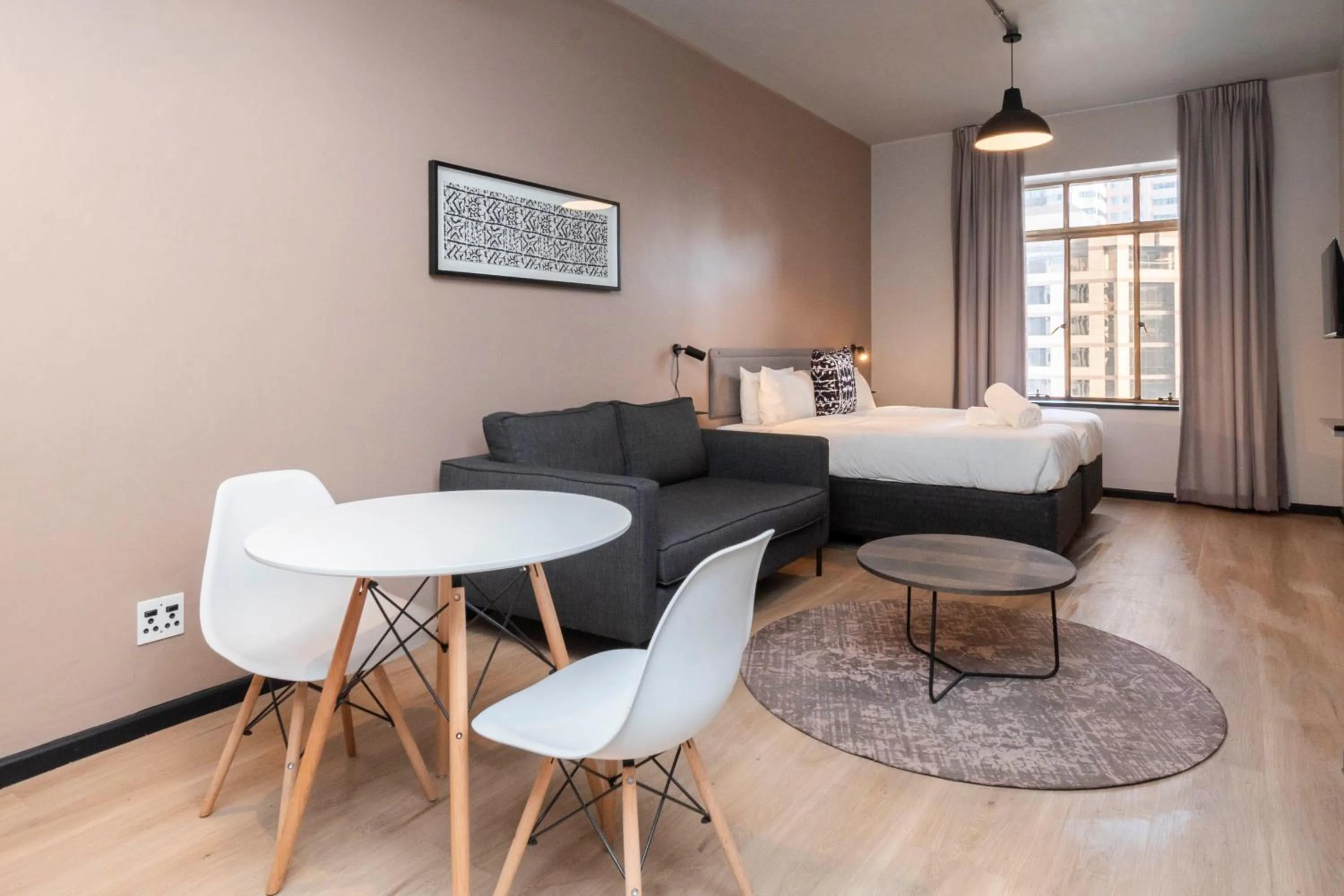 Living room in HAVN Aparthotel by Totalstay