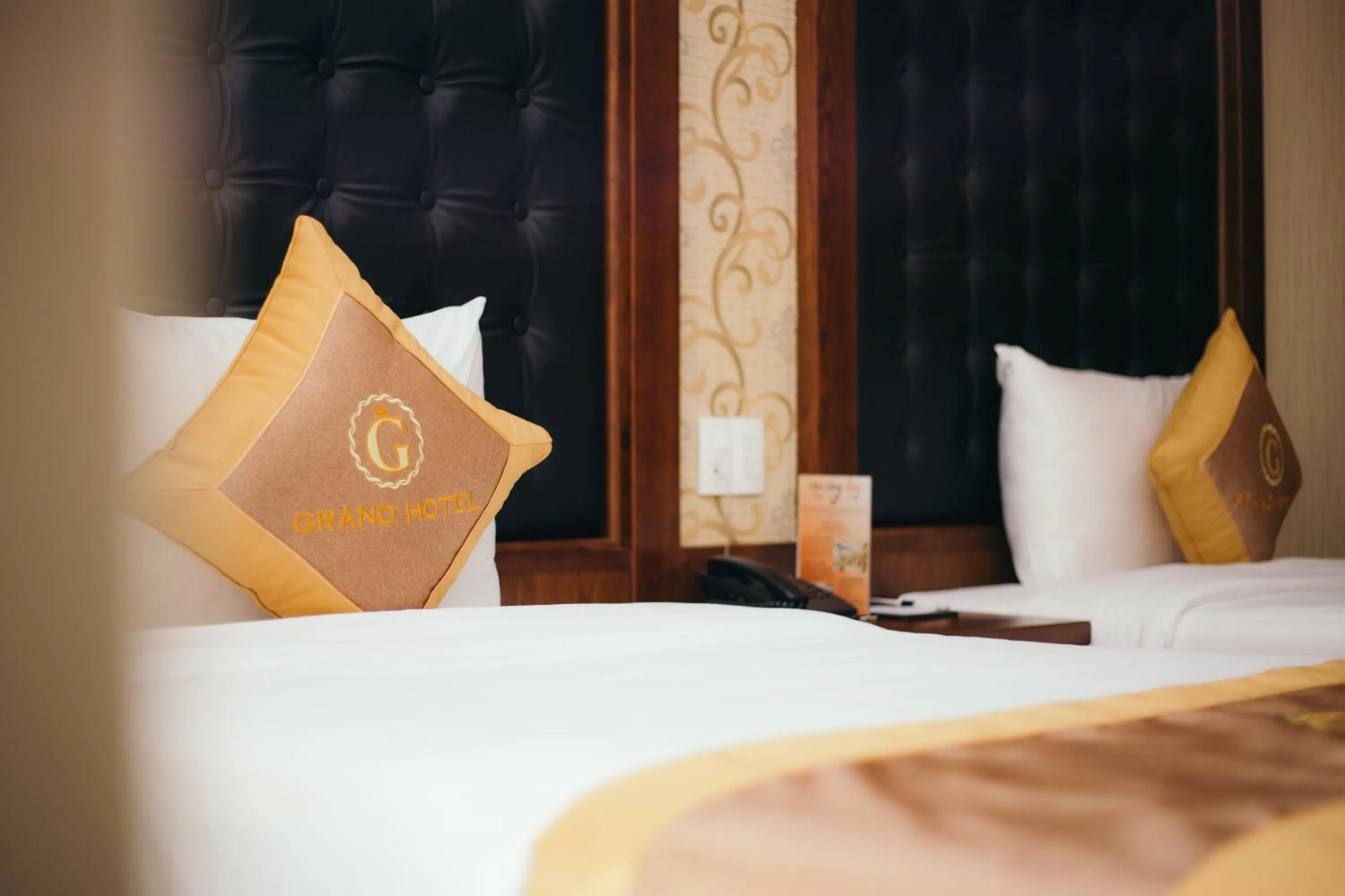 Bed in Grand Móng Cái Hotel