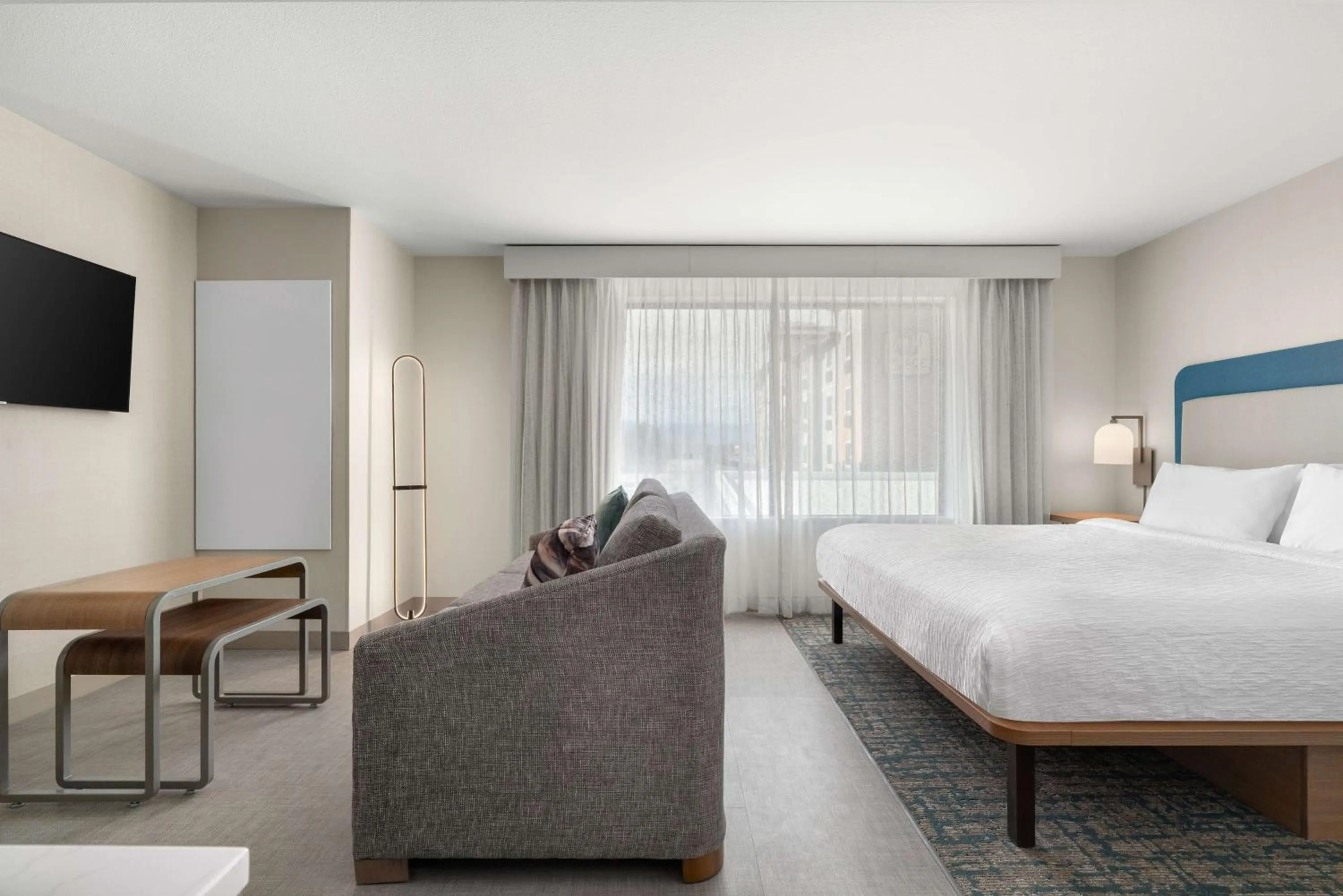 Living room, Bed in Homewood Suites By Hilton North Las Vegas Speedway