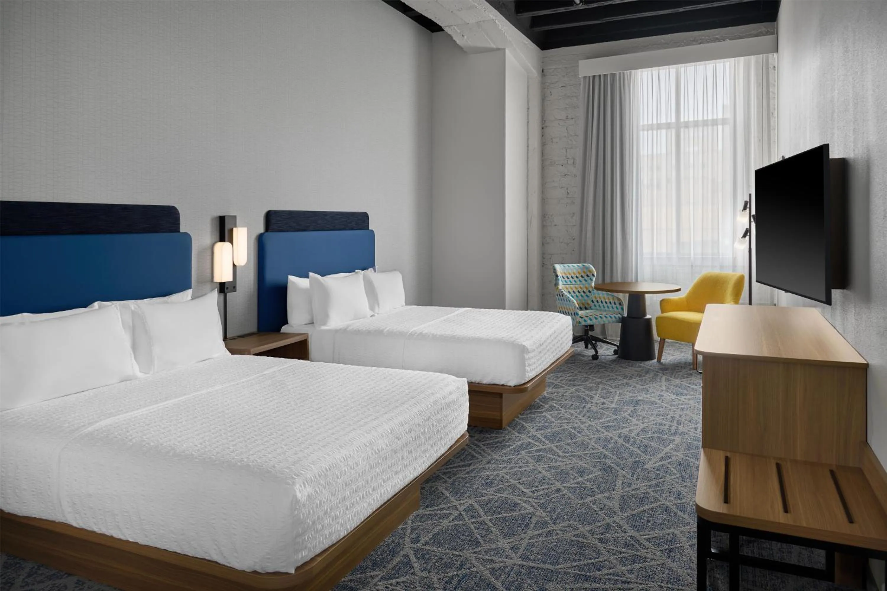 Bed in Hampton Inn by Hilton Lincoln Downtown