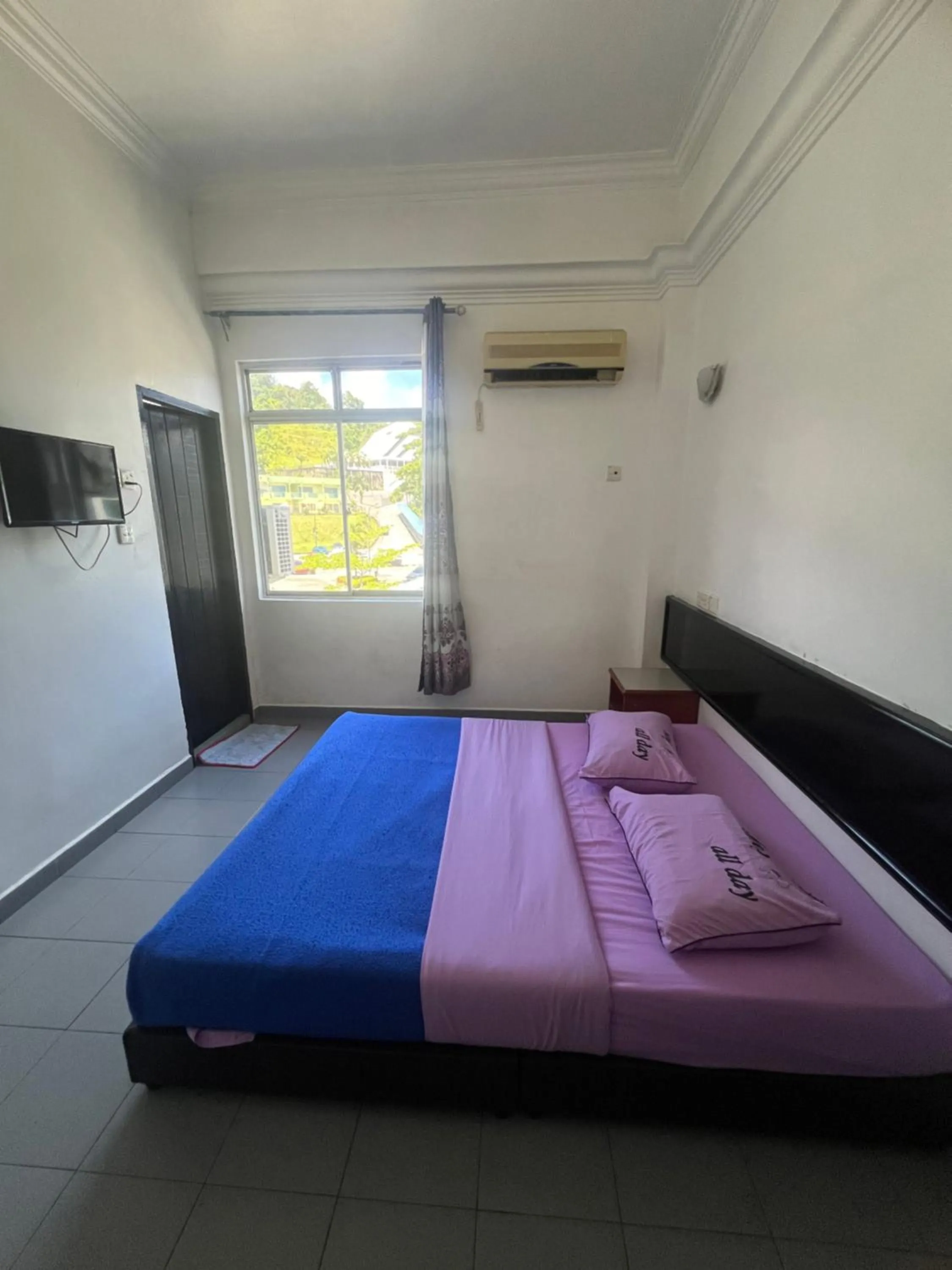 Bed in Dung Fang Hotel