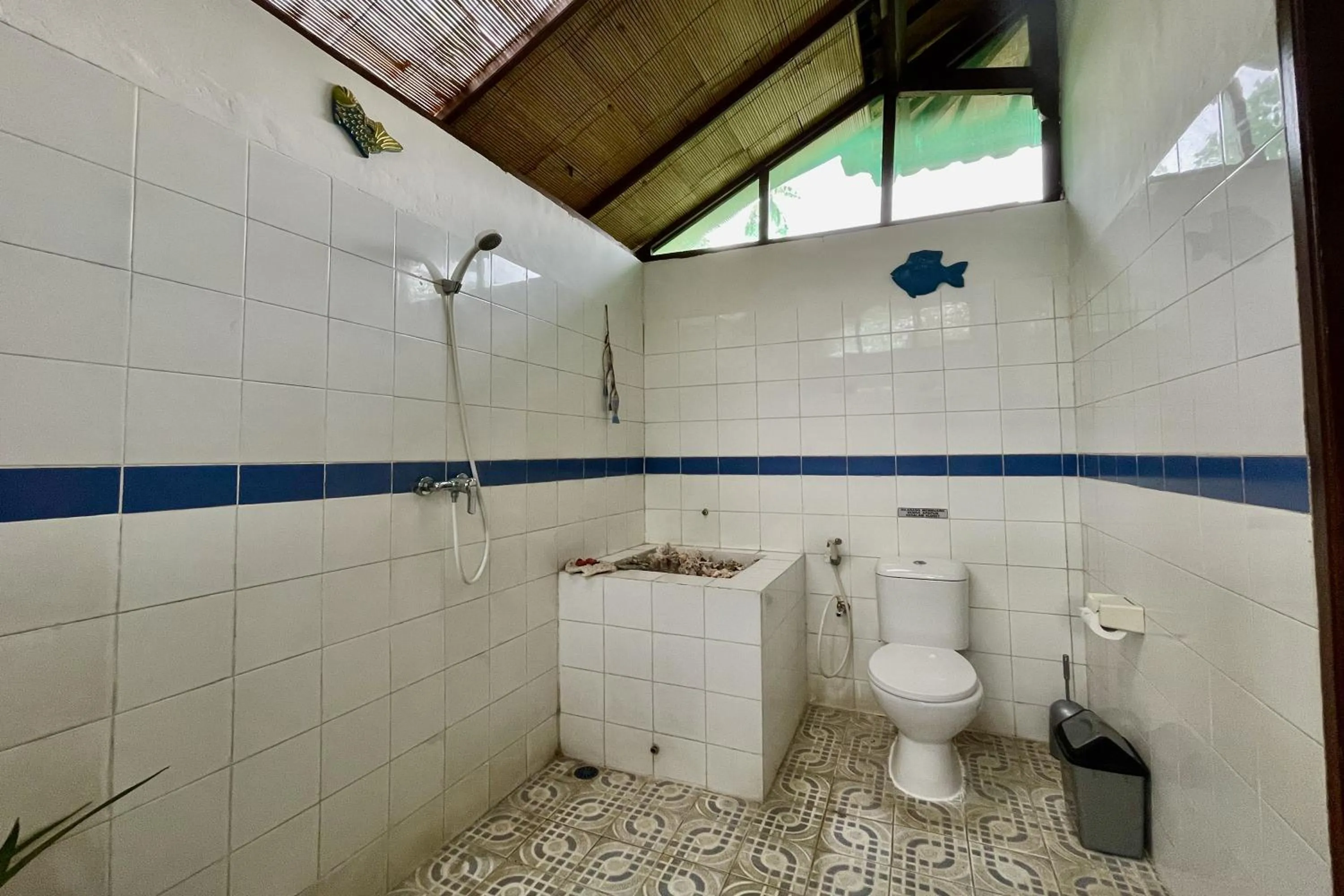 Bathroom in Raja's Bungalows