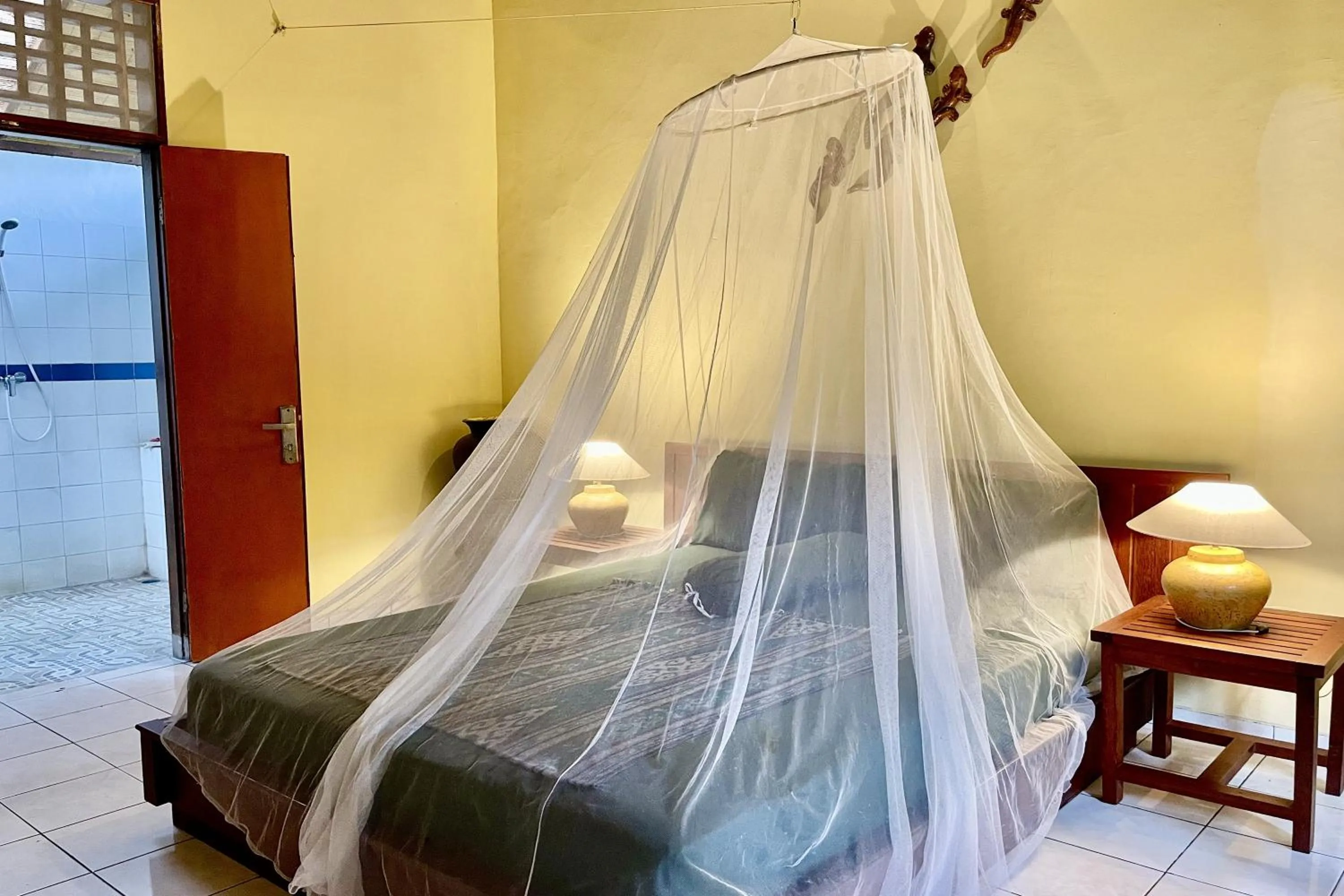 Bed in Raja's Bungalows