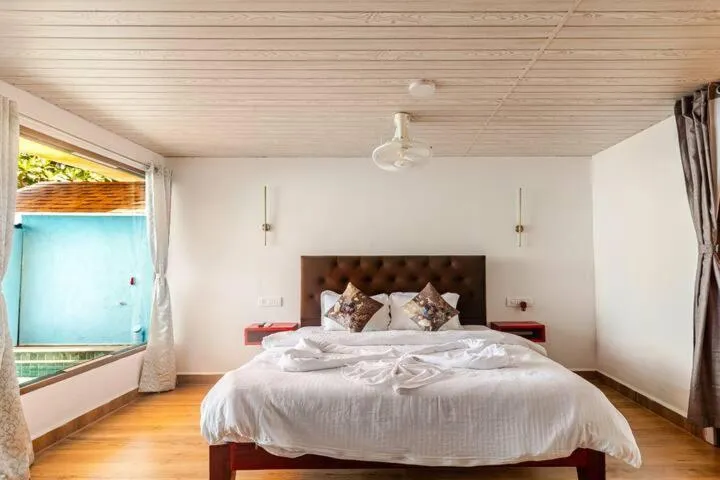 Bed in Sea Shades Cottages I Private Jacuzzi