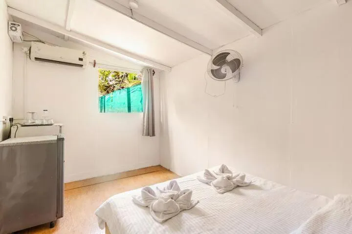 Photo of the whole room, Bed in Sea Shades Cottages I Private Jacuzzi