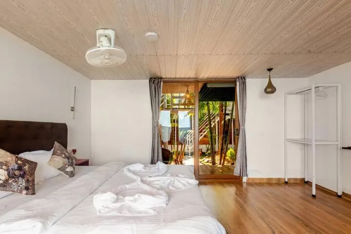 Photo of the whole room, Bed in Sea Shades Cottages I Private Jacuzzi