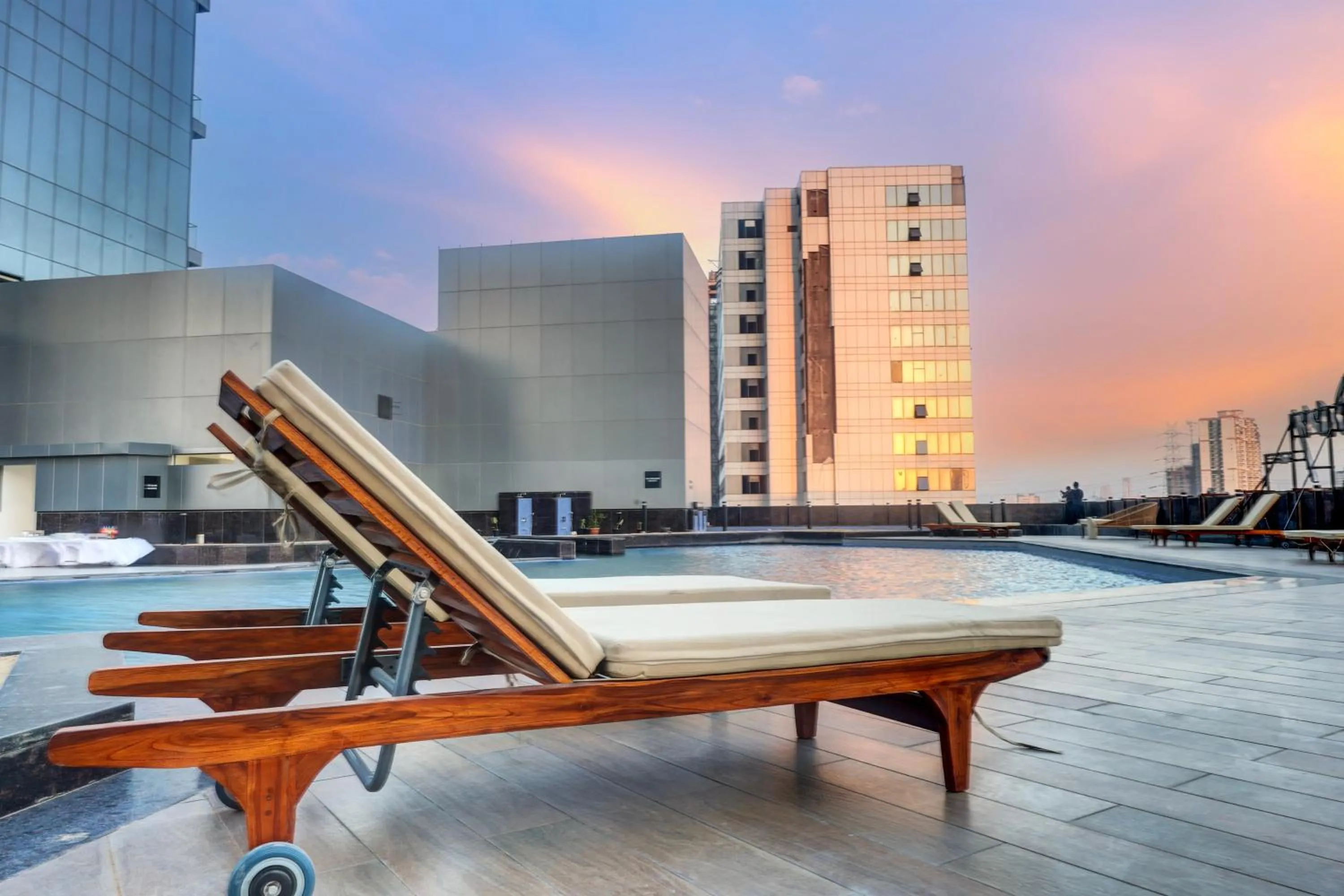 Swimming pool in Sunday Hotel & Residences by CheckIn Gurugram