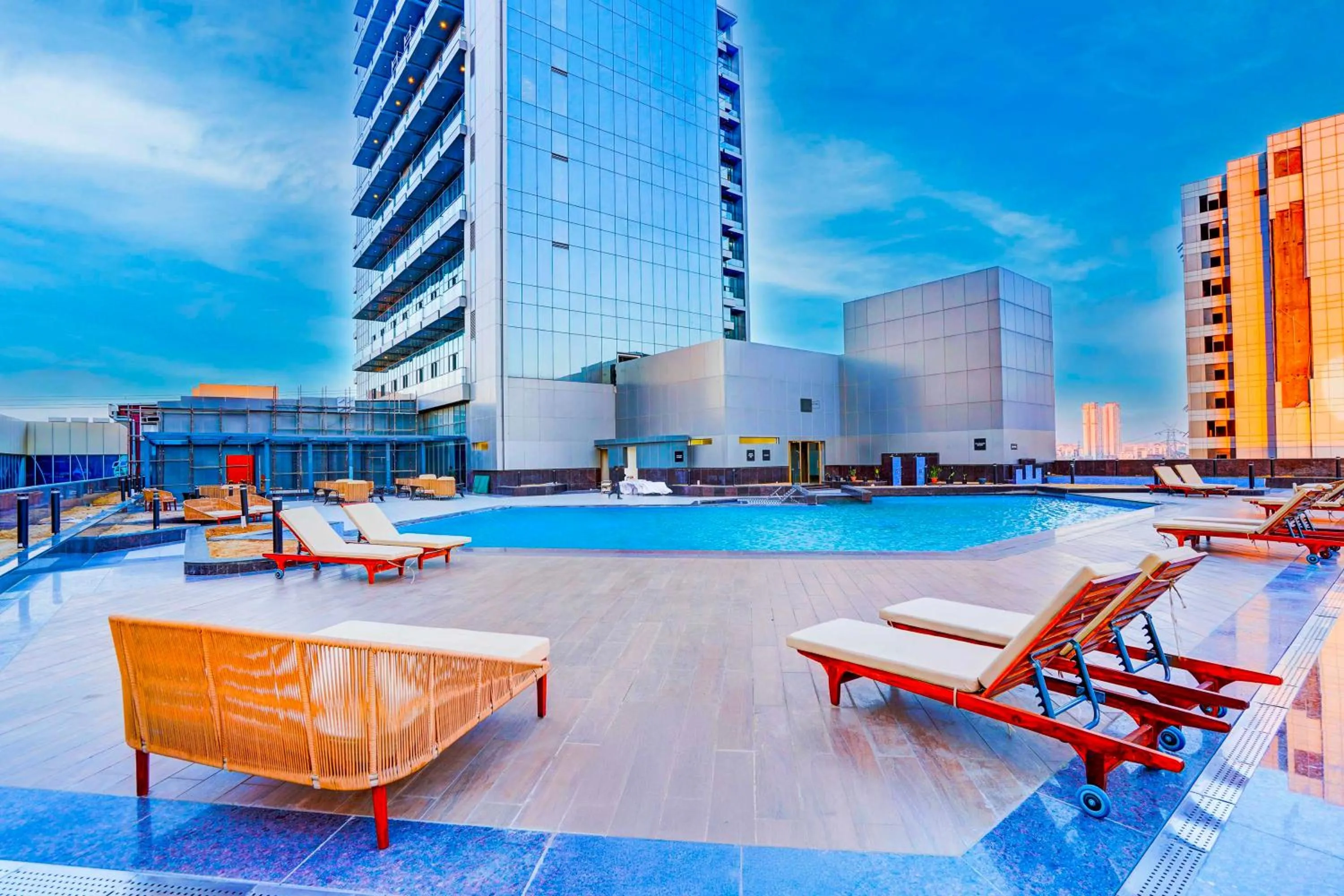 Swimming pool in Sunday Hotel & Residences by CheckIn Gurugram