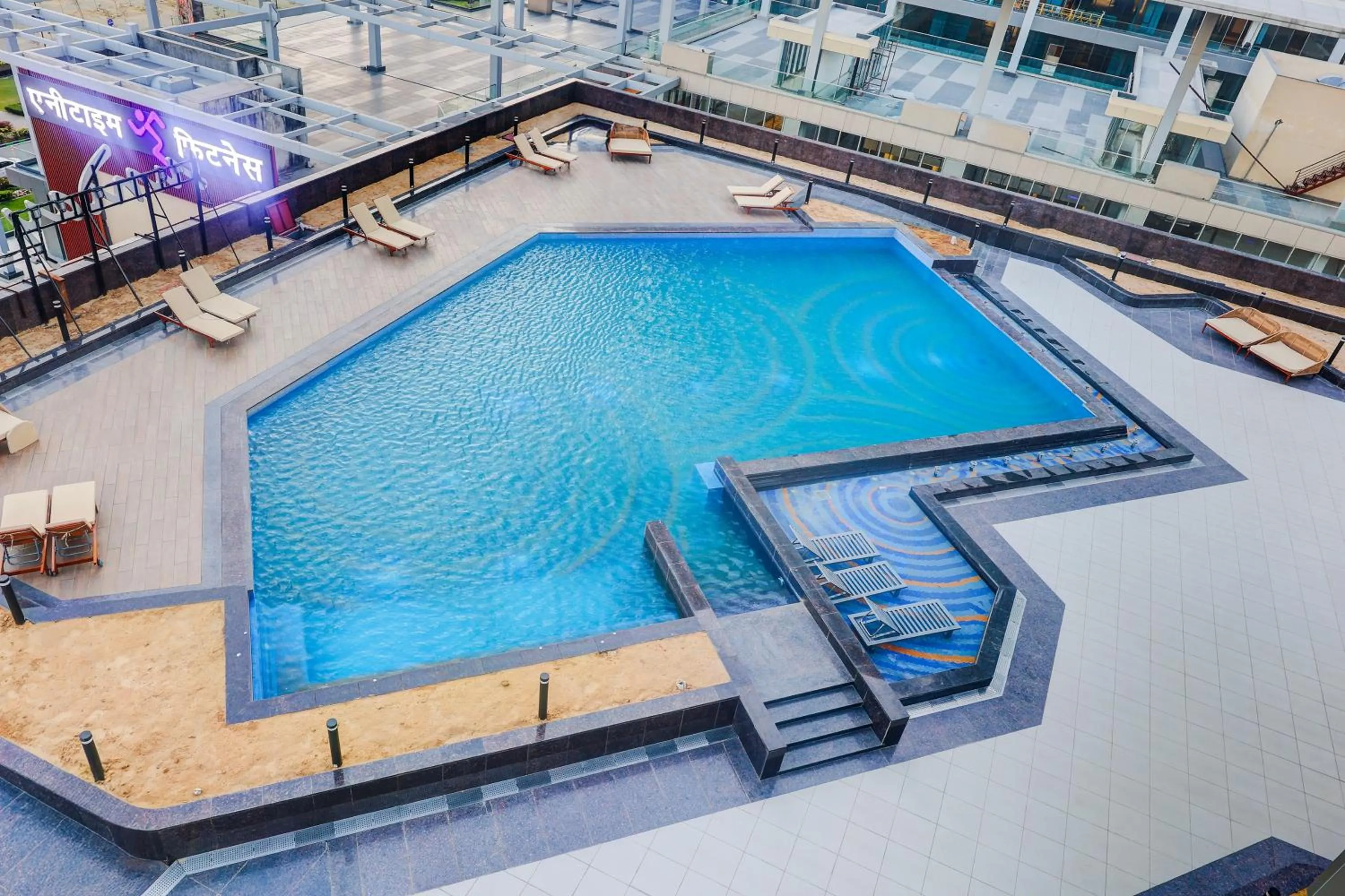 Swimming pool in Sunday Hotel & Residences by CheckIn Gurugram