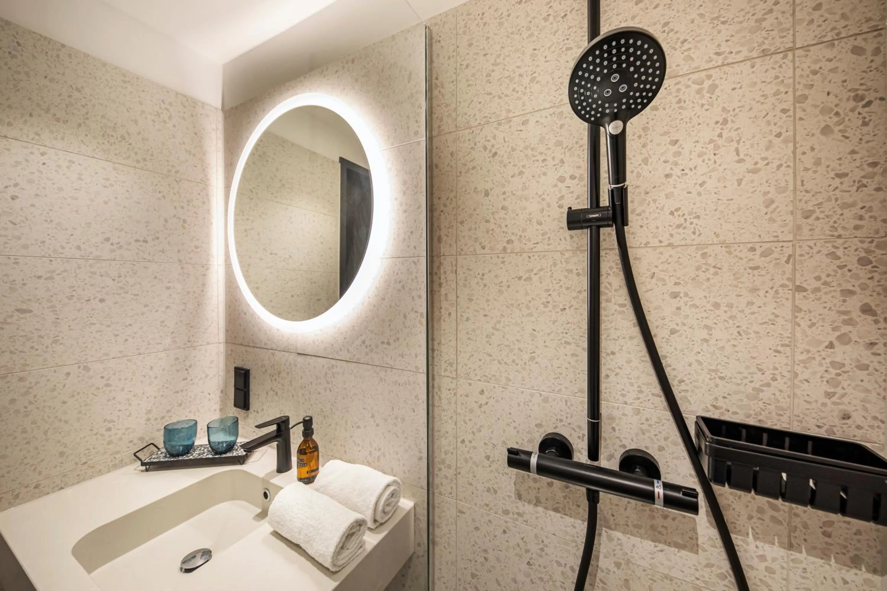 Bathroom in LOGINN Hotel Köln Airport