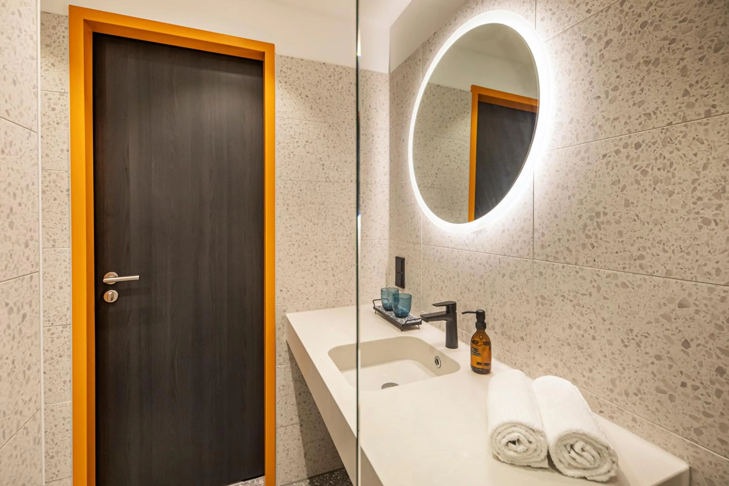 Bathroom in LOGINN Hotel Köln Airport