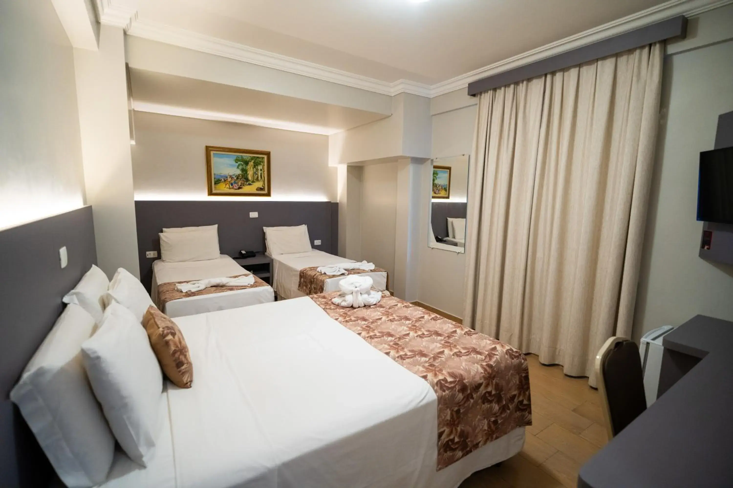 Quadruple Room in Tarobá Hotel Quadruple Room in Tarobá Hotel