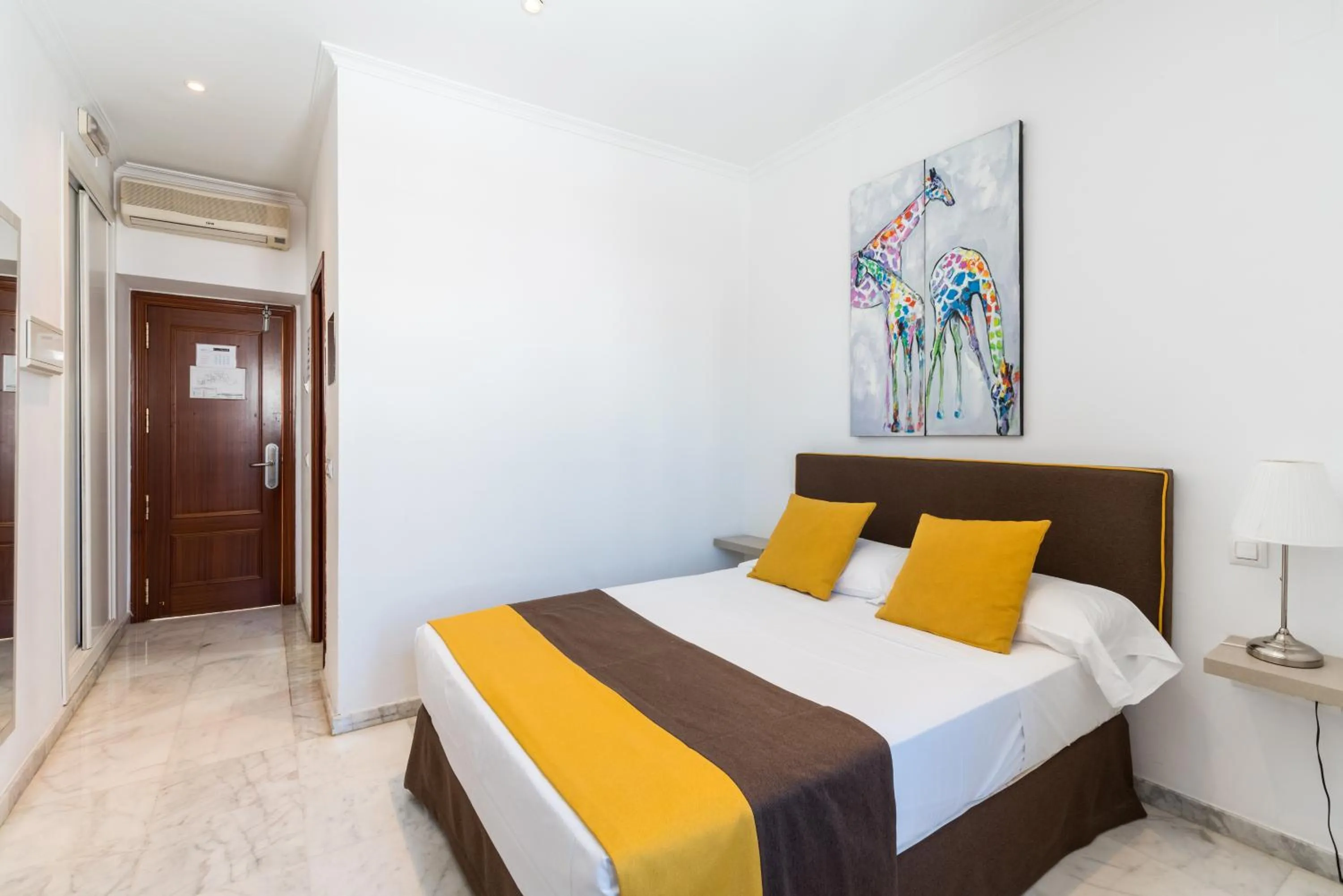 Bed in Cool Sevilla Hotel