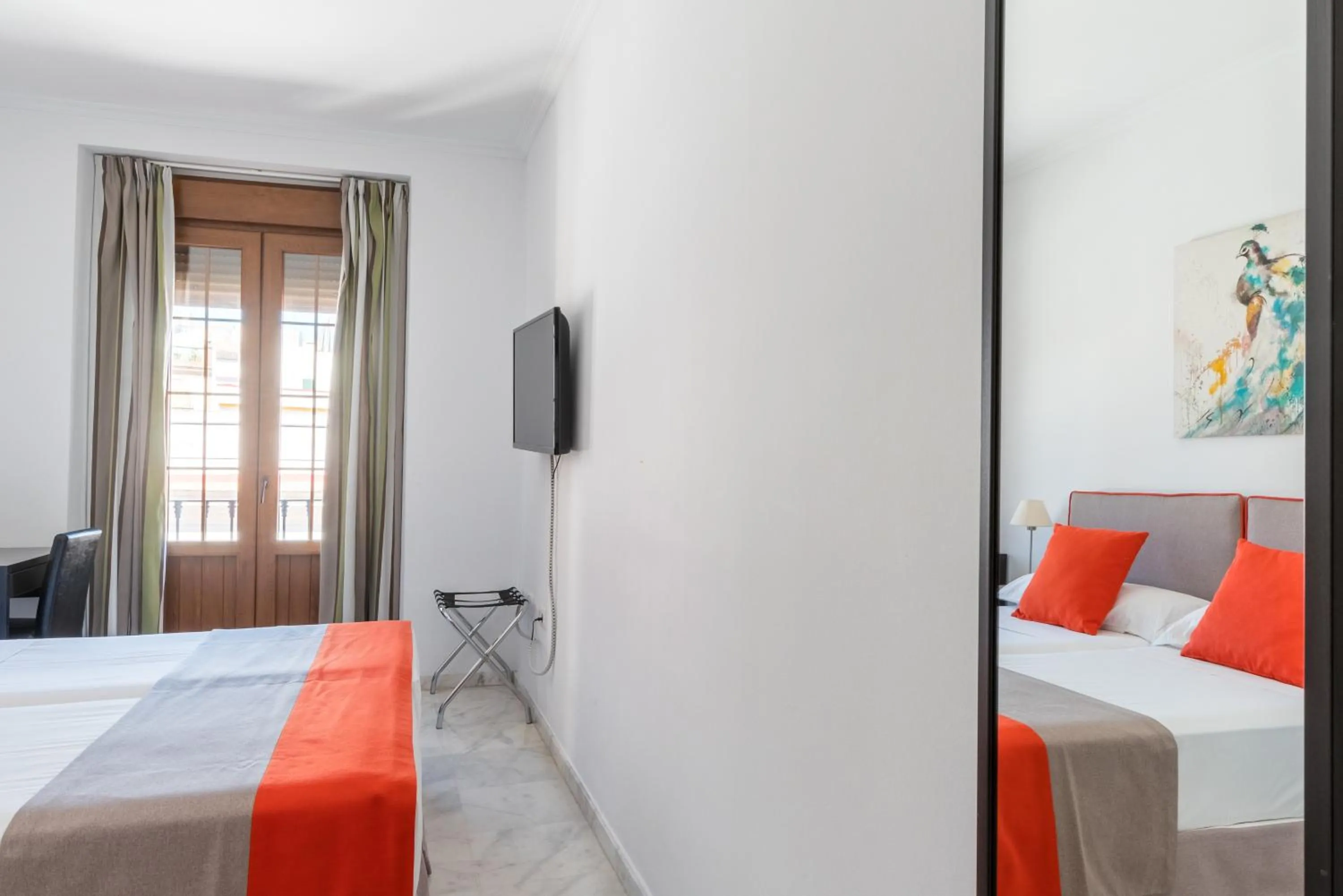 Bed in Cool Sevilla Hotel