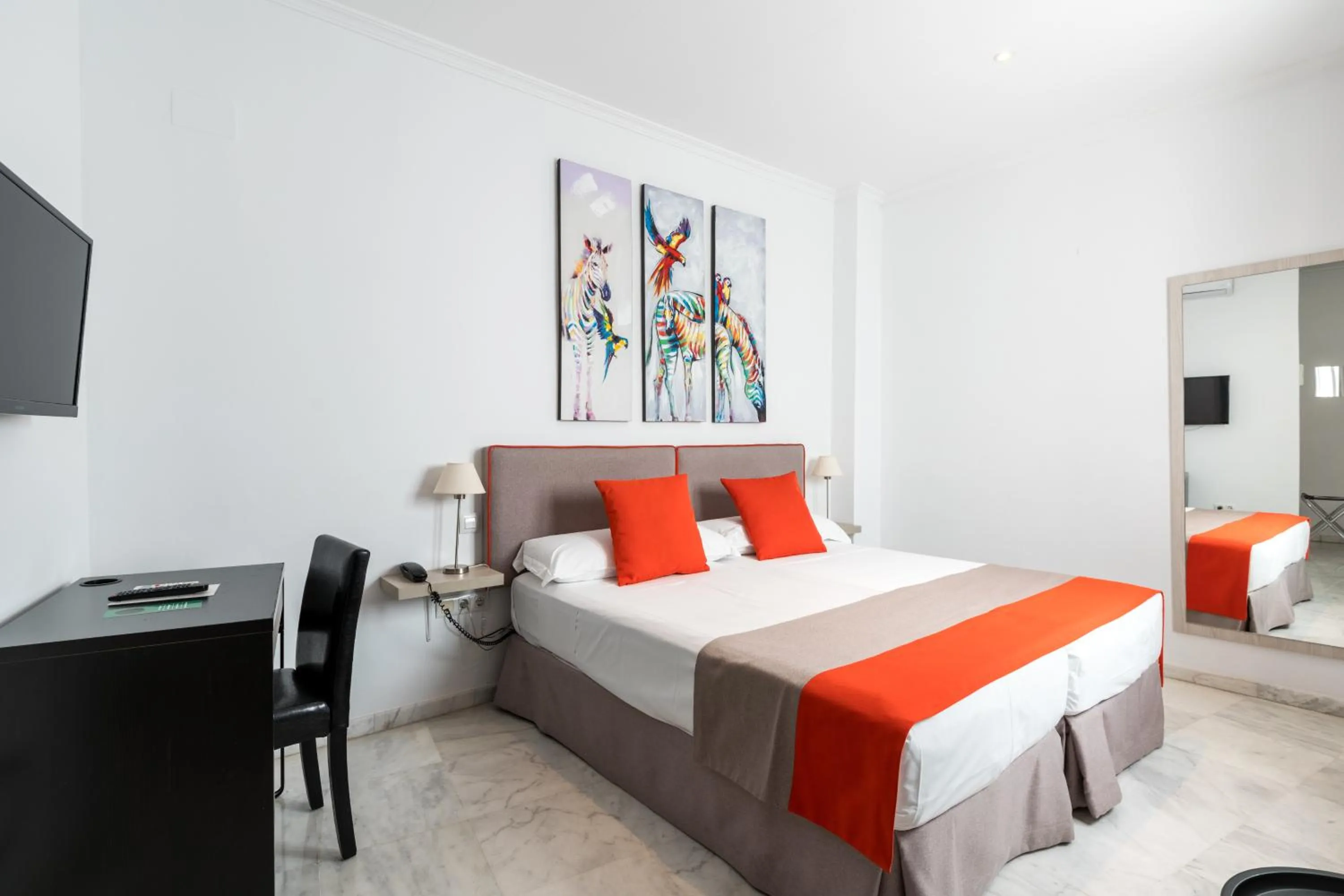 Bed in Cool Sevilla Hotel