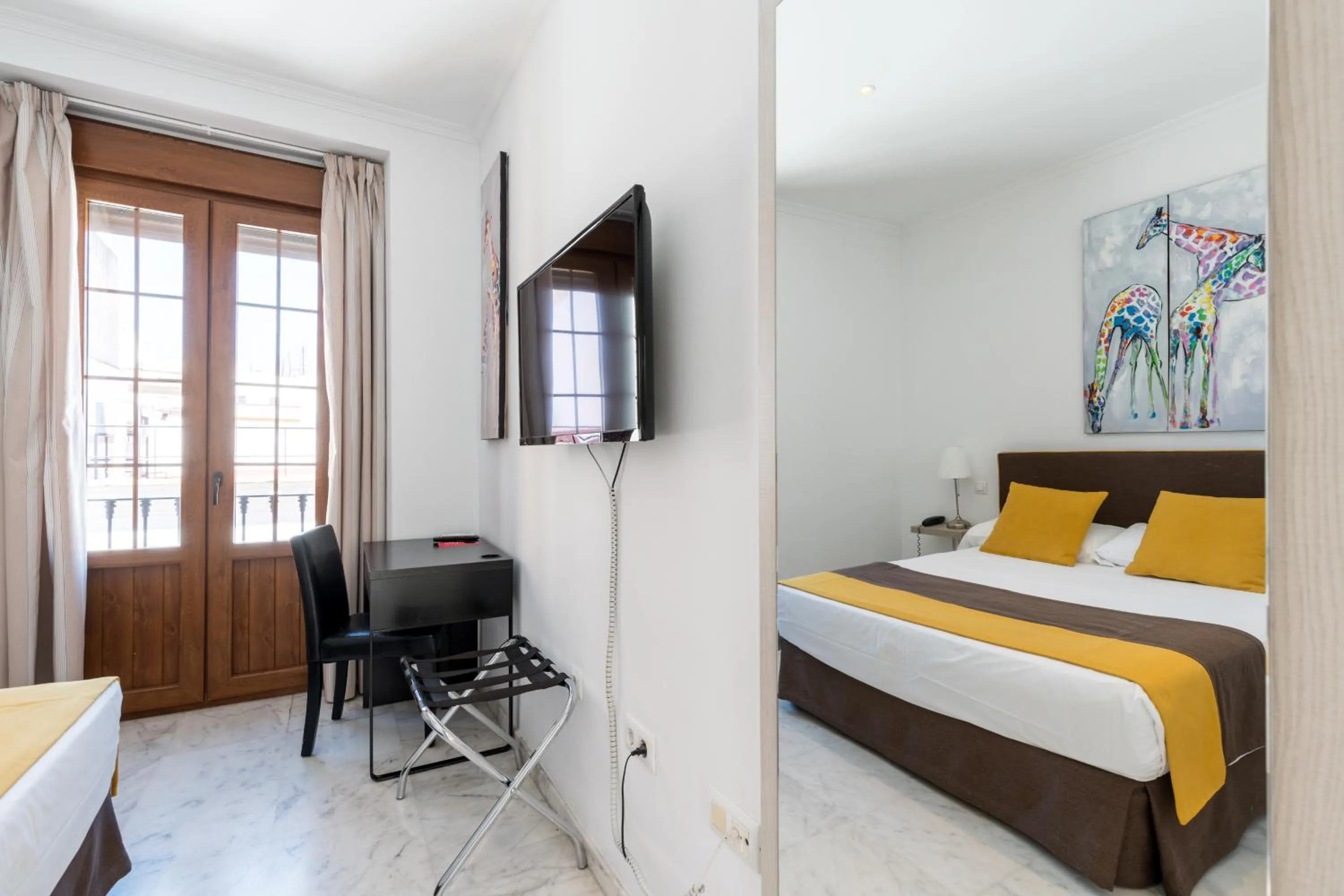 Bed in Cool Sevilla Hotel