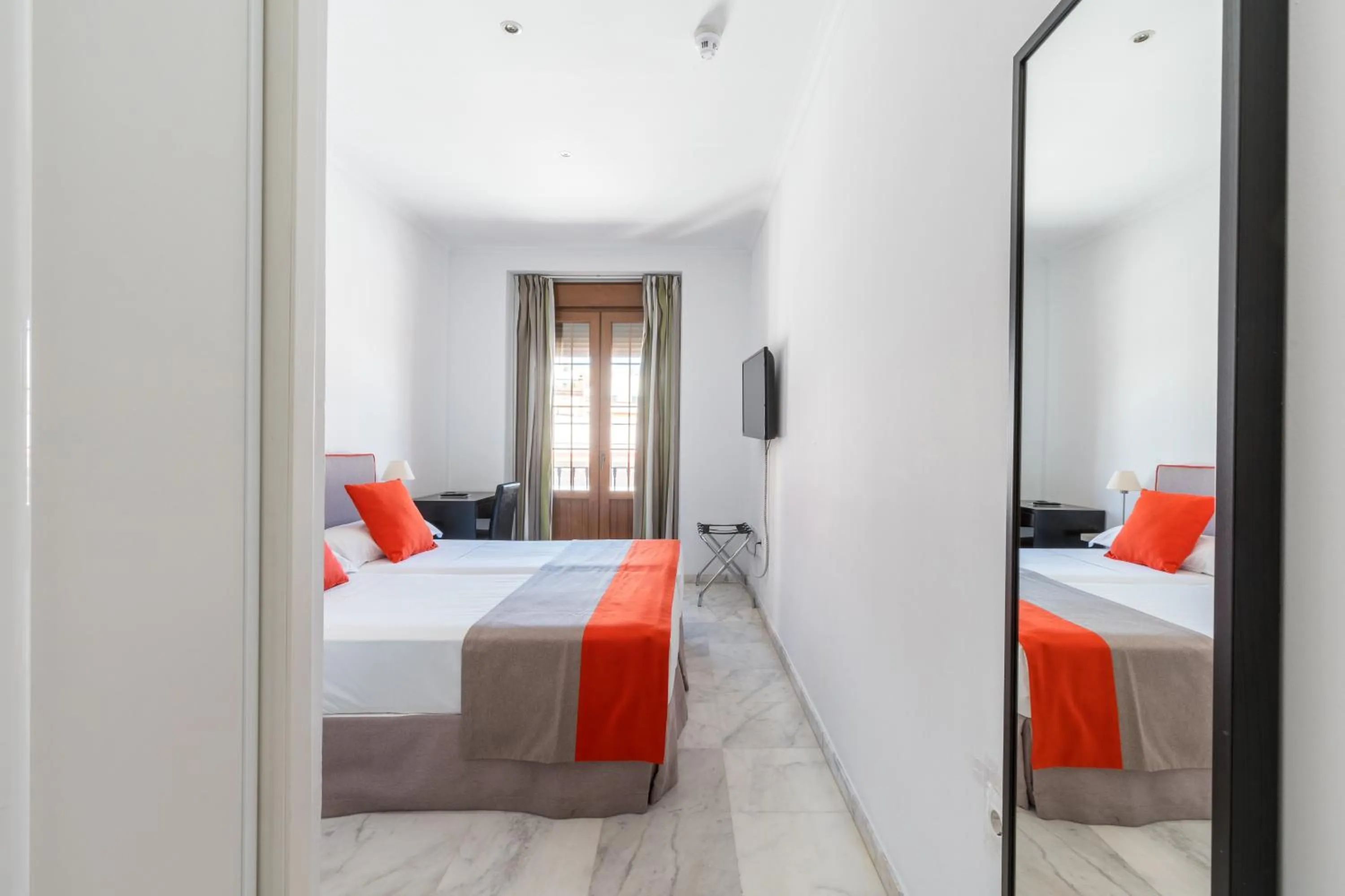 Bed in Cool Sevilla Hotel