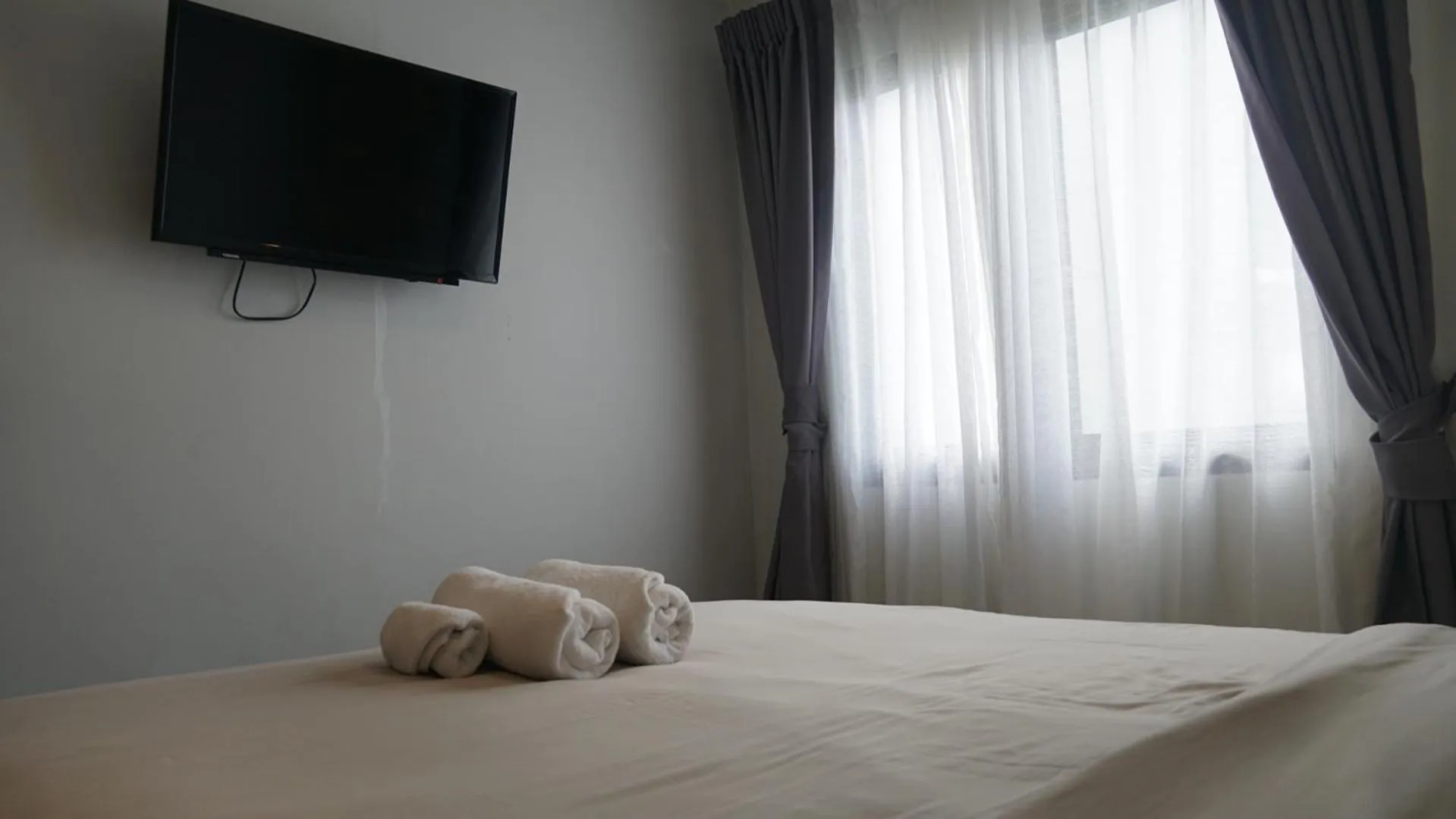 Bed in Island Escape 1BR T1-206