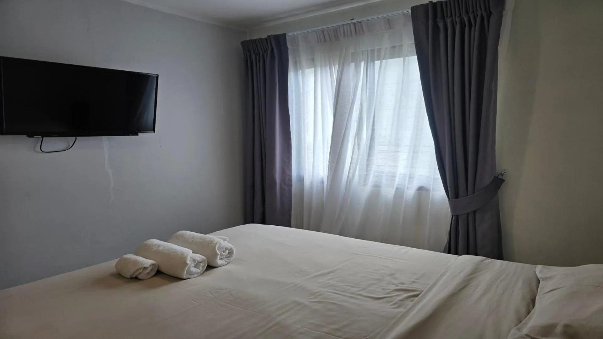 Bed in Island Escape 1BR T1-206