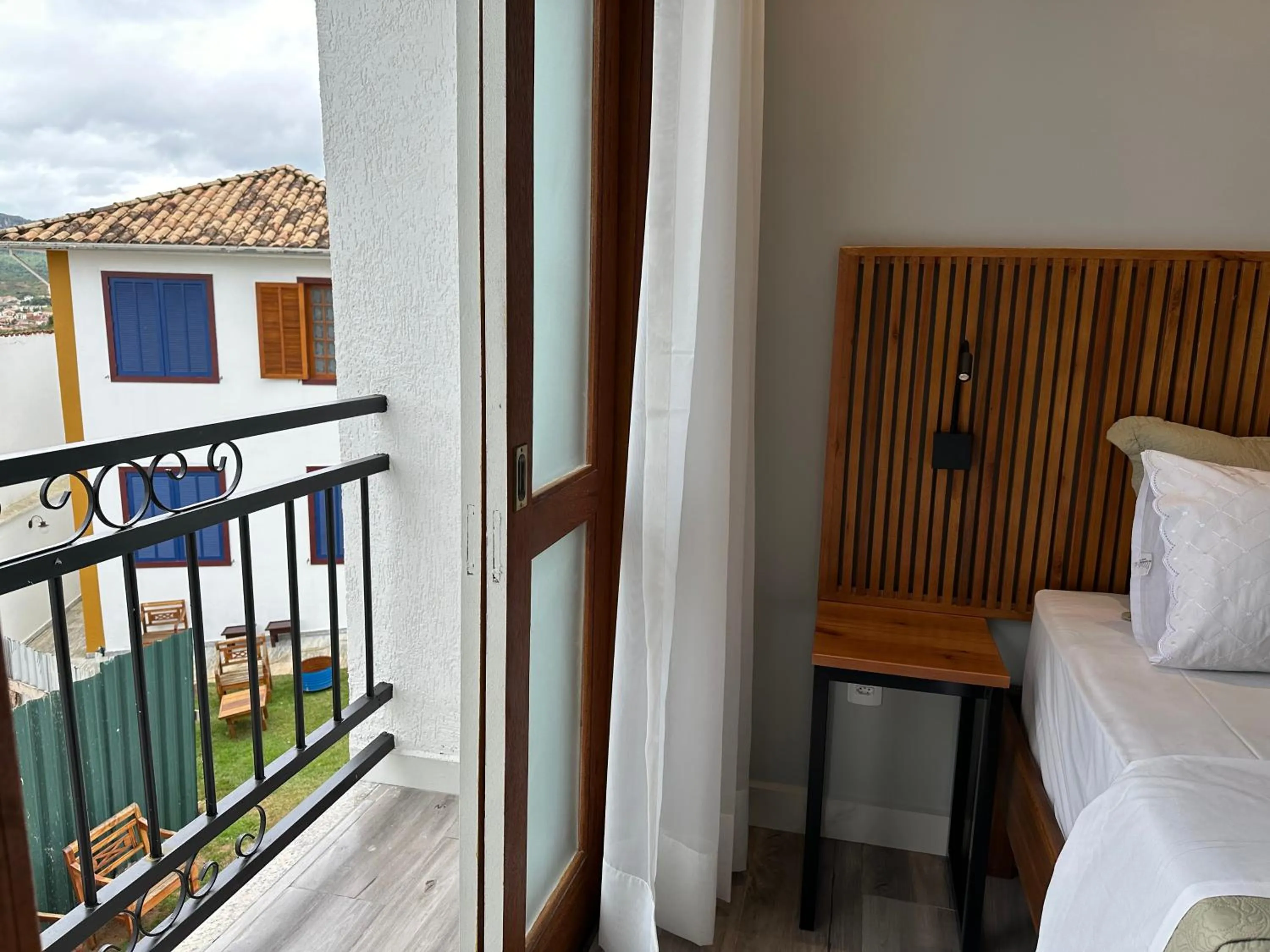 Photo of the whole room, Bed in Pousada Maria Monteiro Tiradentes