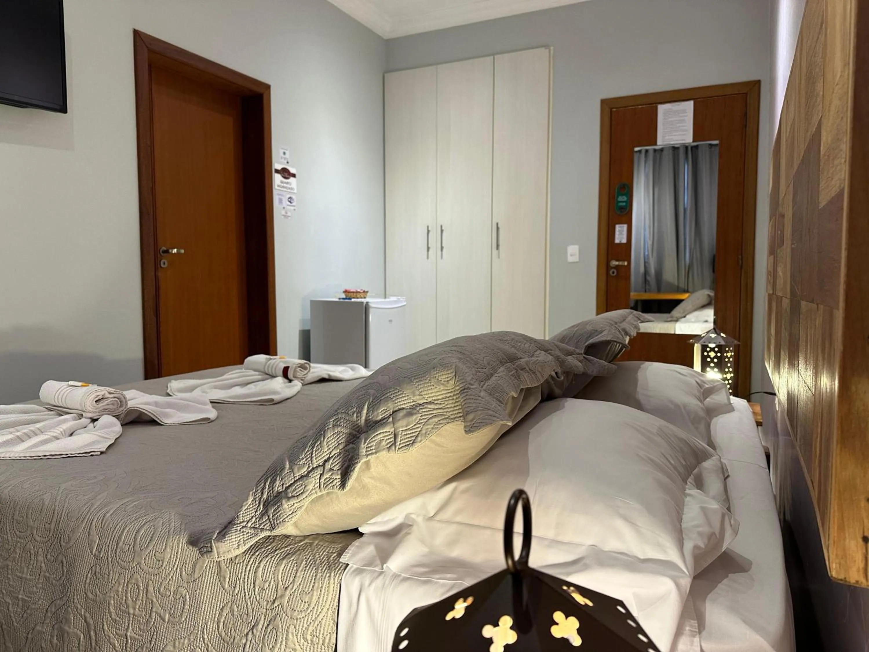 Bed in Pousada Maria Monteiro Tiradentes