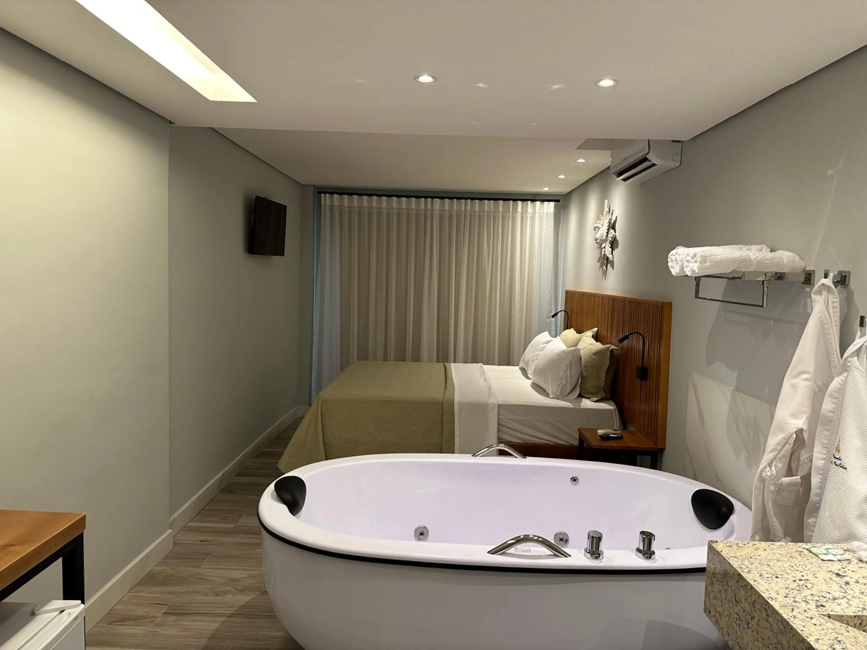 Bed in Pousada Maria Monteiro Tiradentes