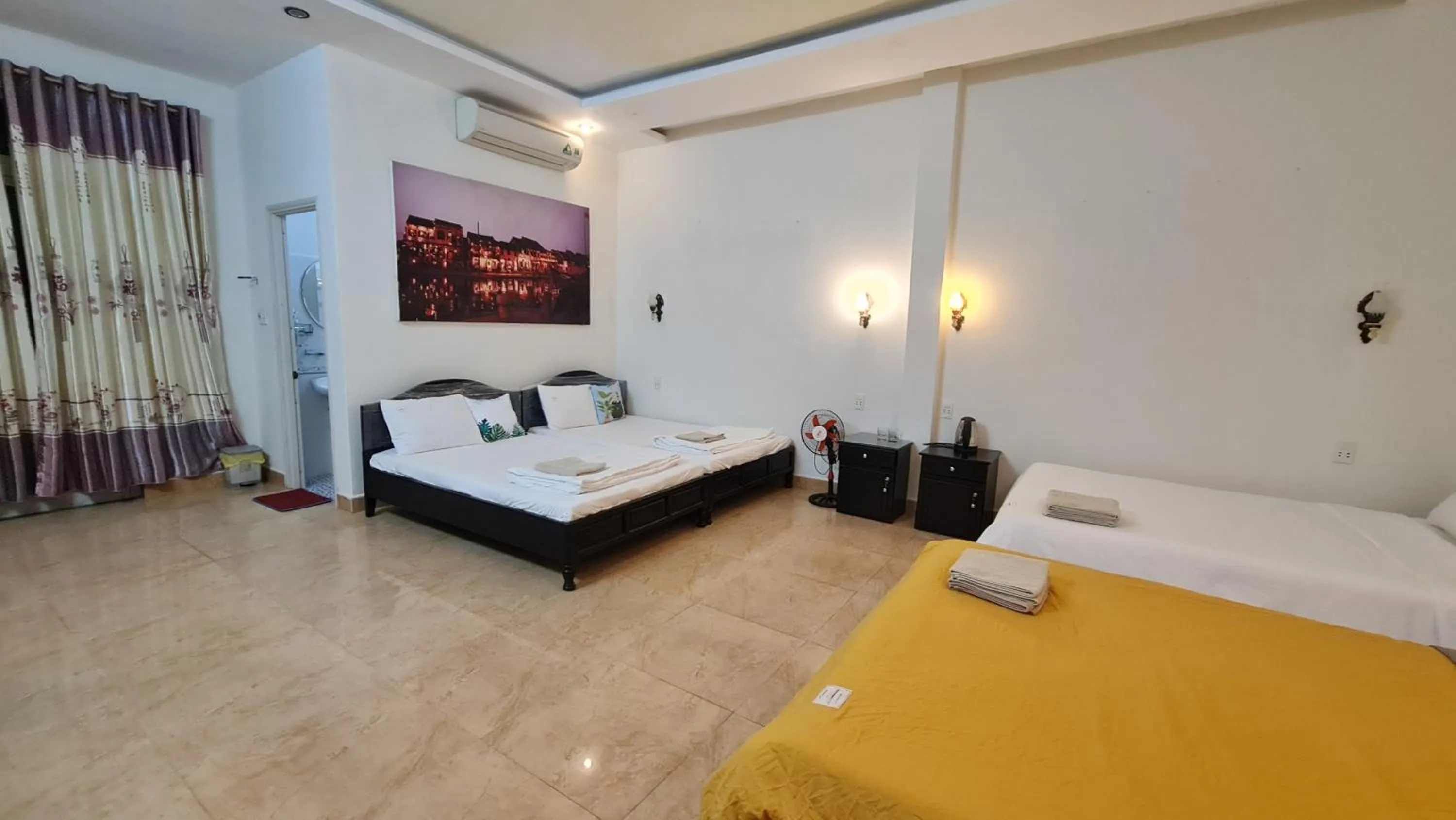 Bed in Minh Trang Villa Hoi An -BBQ Garden